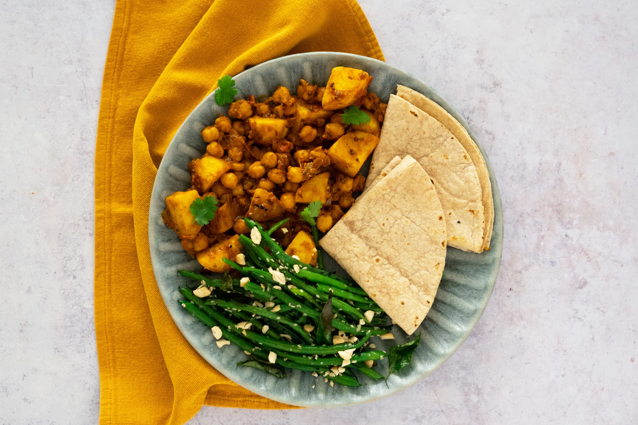 Bombay Potatoes and Chickpeas with Seedy Green Beans and Chapatis