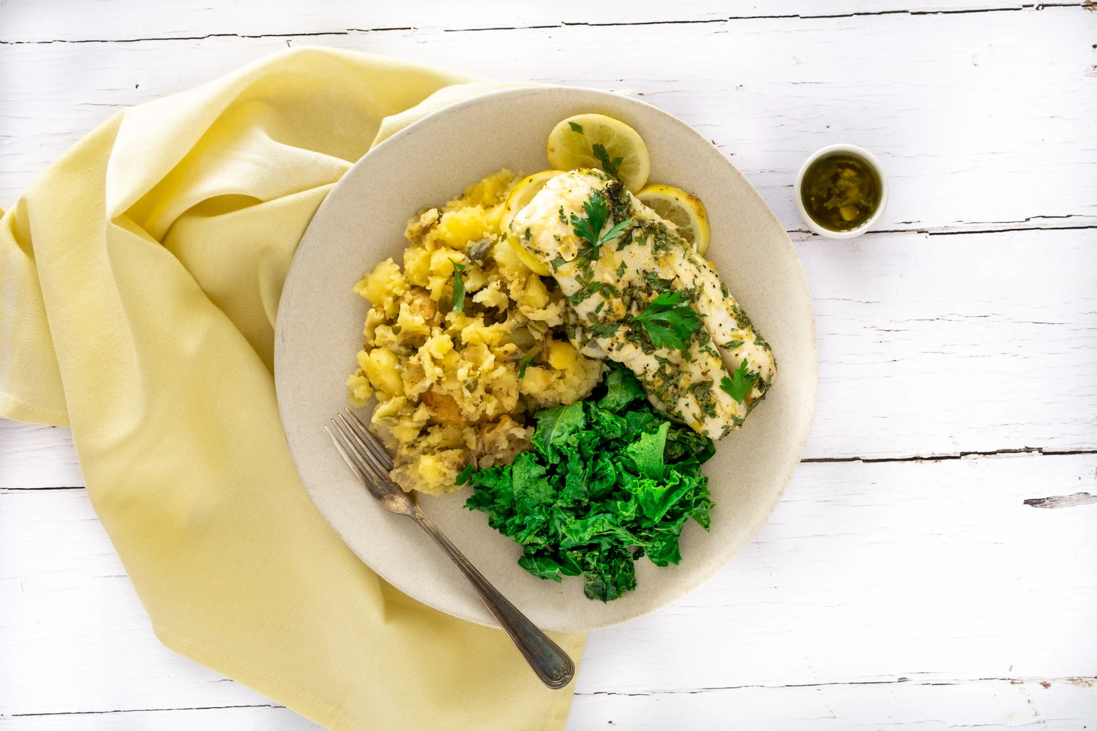 Baked Lemon and Garlic Cod with Crushed Caper Potatoes and Kale