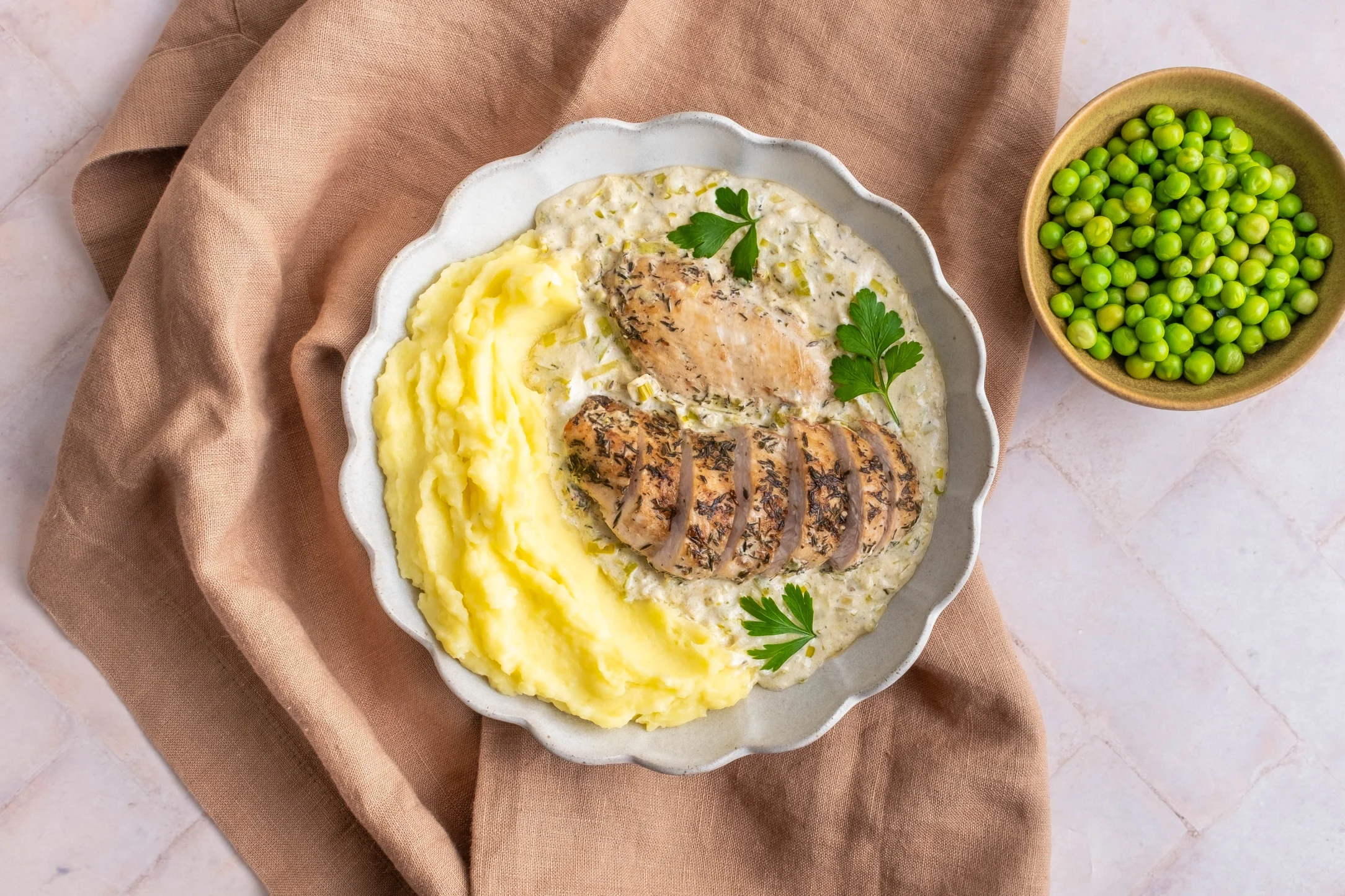 Chicken in a Creamy Leek Sauce with Mashed Potatoes and Peas