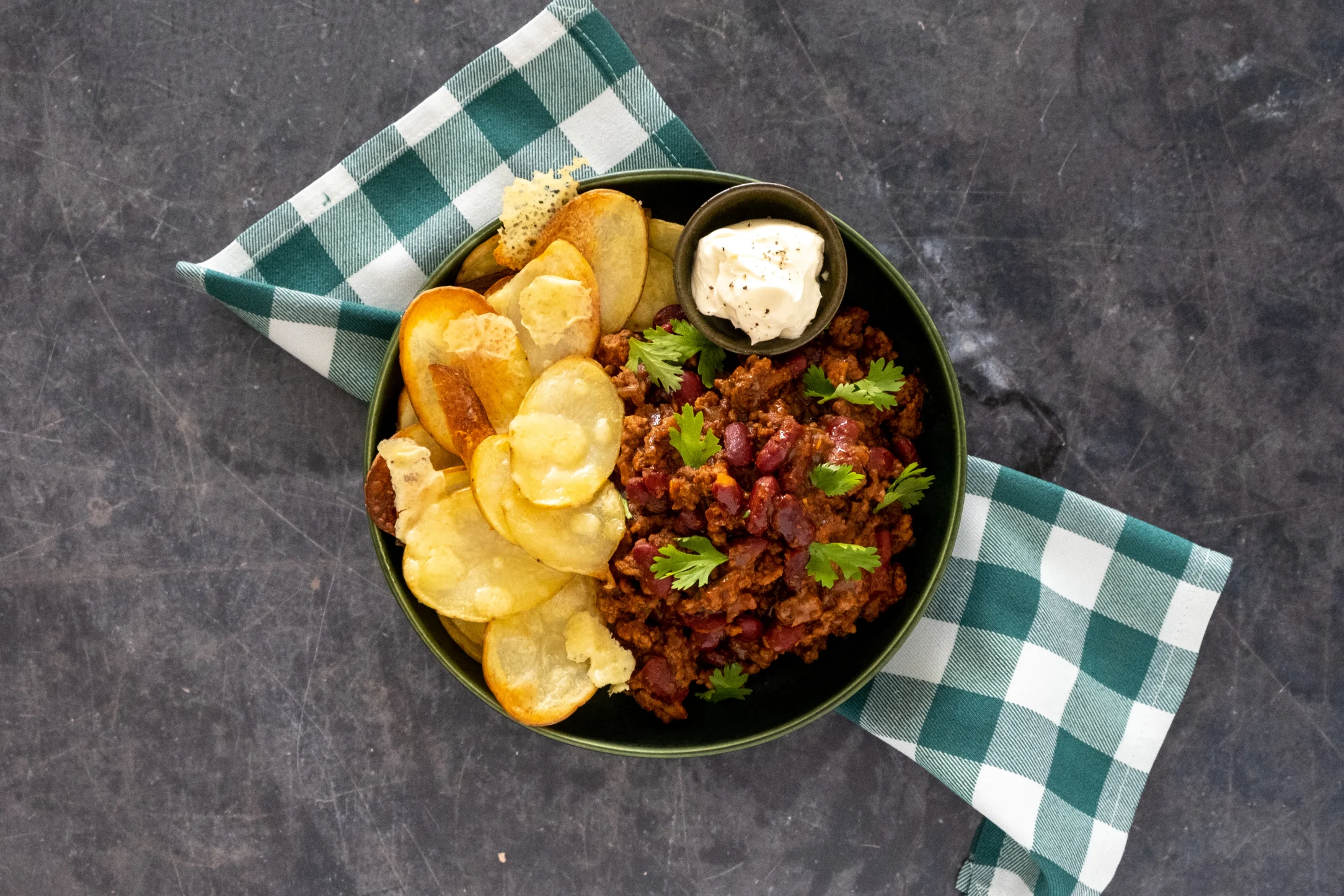 Baked Potato Nachos with Chilli con Carne and Sour Cream