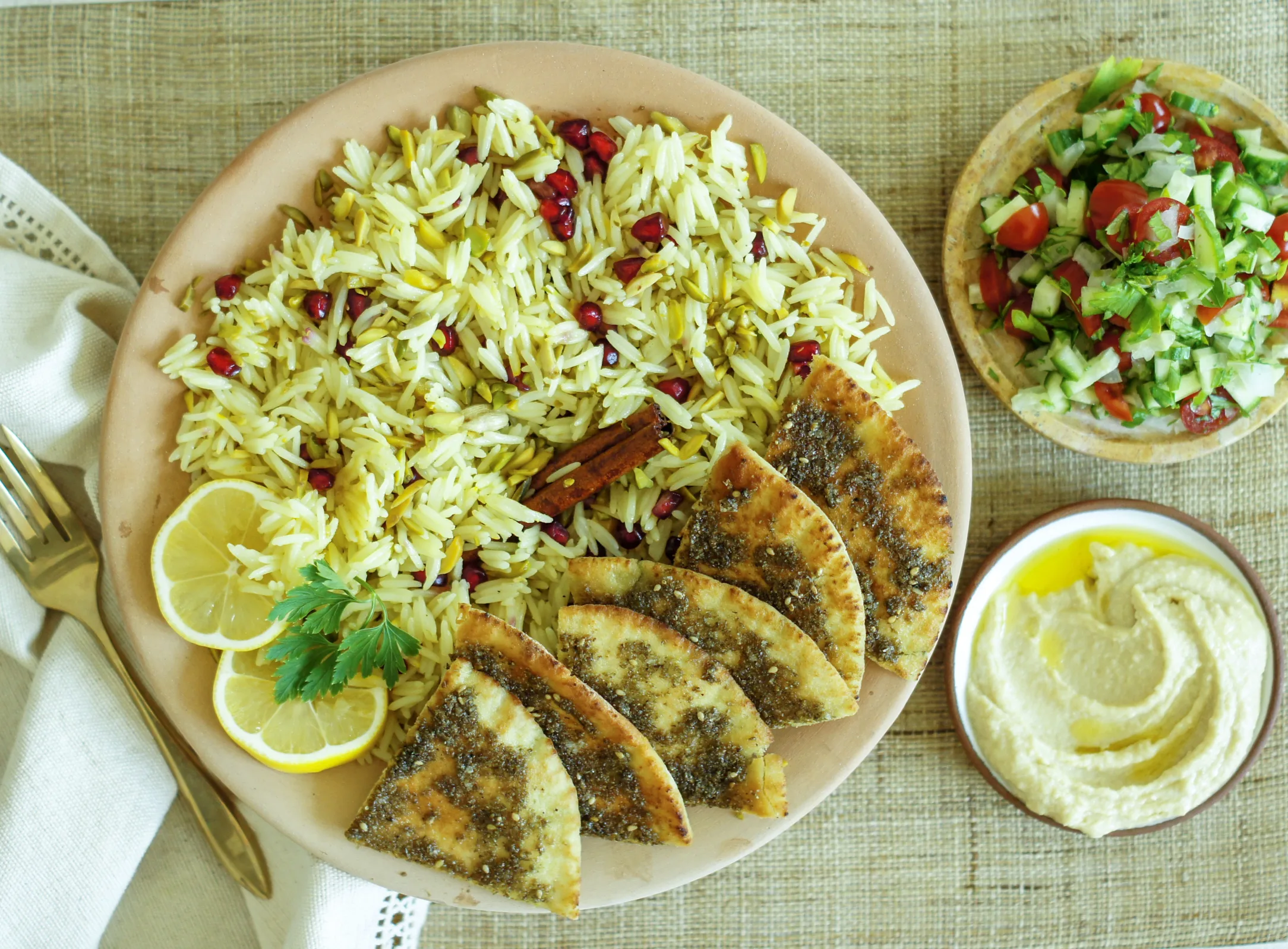 Saffron Pilaf with Hummus, Shirazi Salad and Crispy Bread