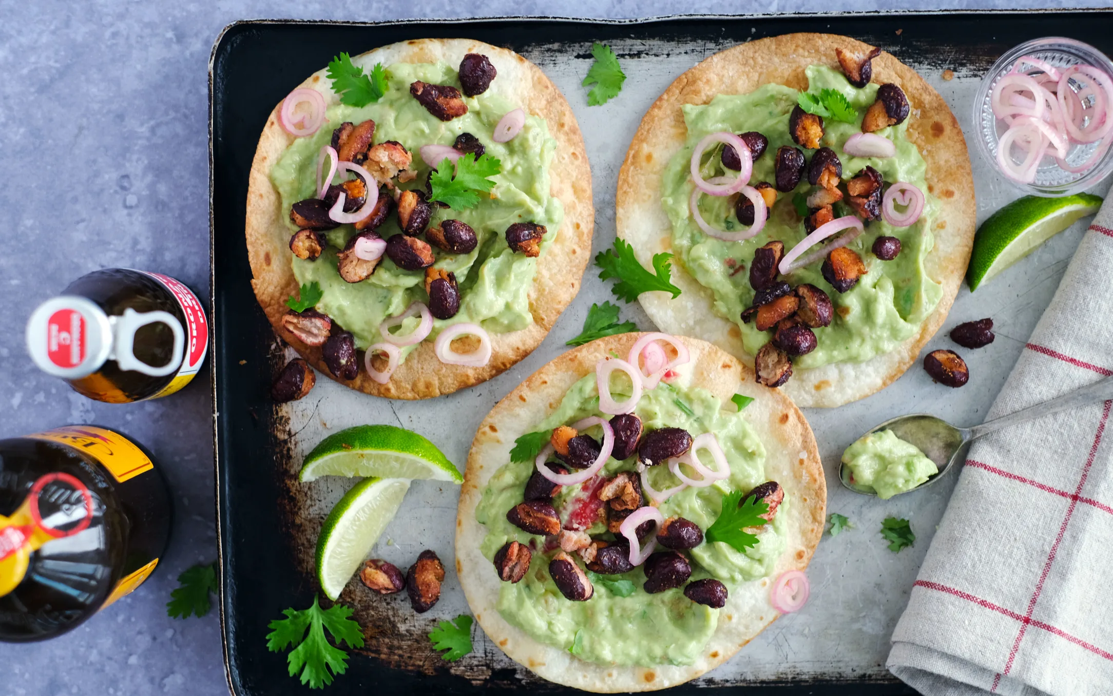 Tostadas with Guacamole, Popped Beans and Pickled Shallots