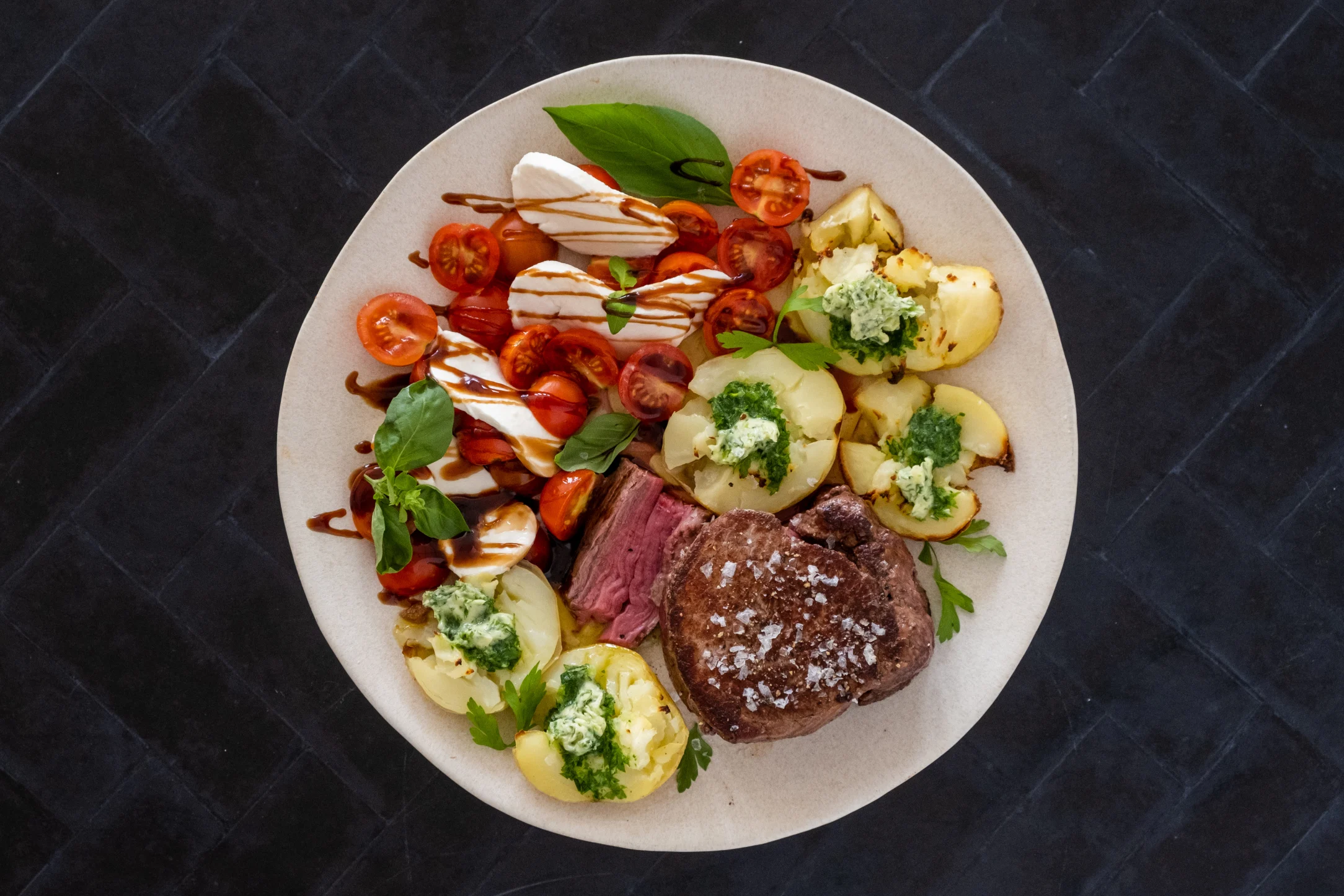 Tenderloin Fillet Steak with Crushed Potatoes and Caprese Salad