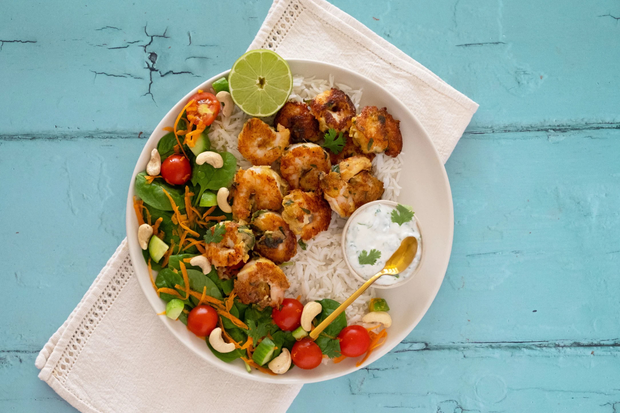 Prawn Koliwada with Basmati Rice, Salad and Coconut Raita