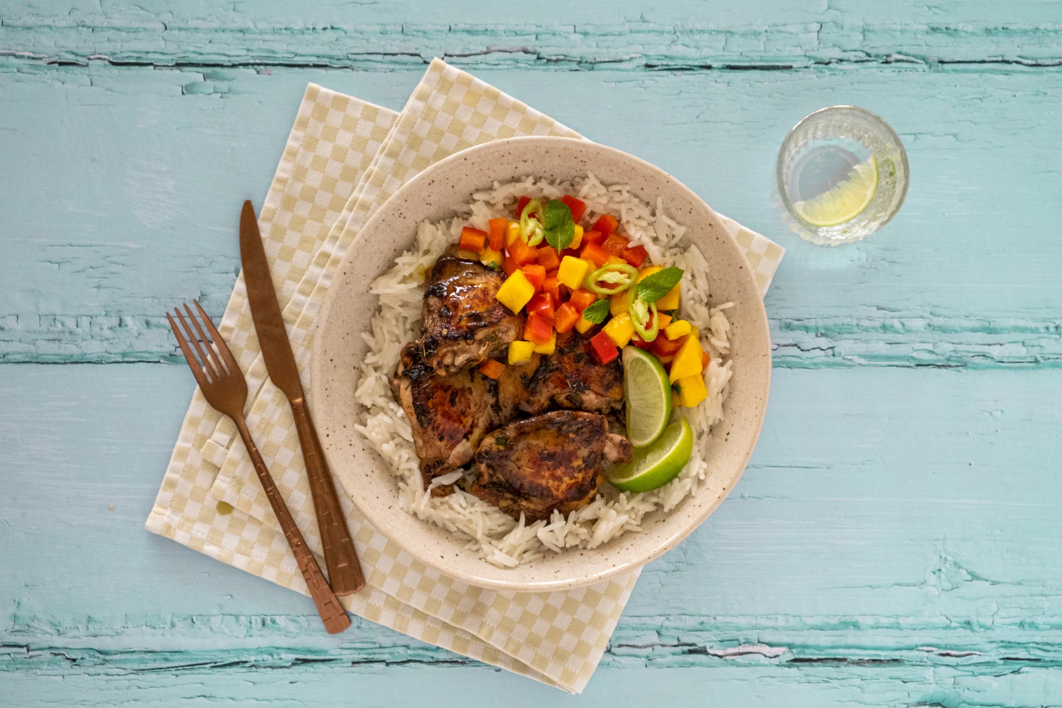 Jerk Chicken Thighs with Coconut Rice and Mango Salsa
