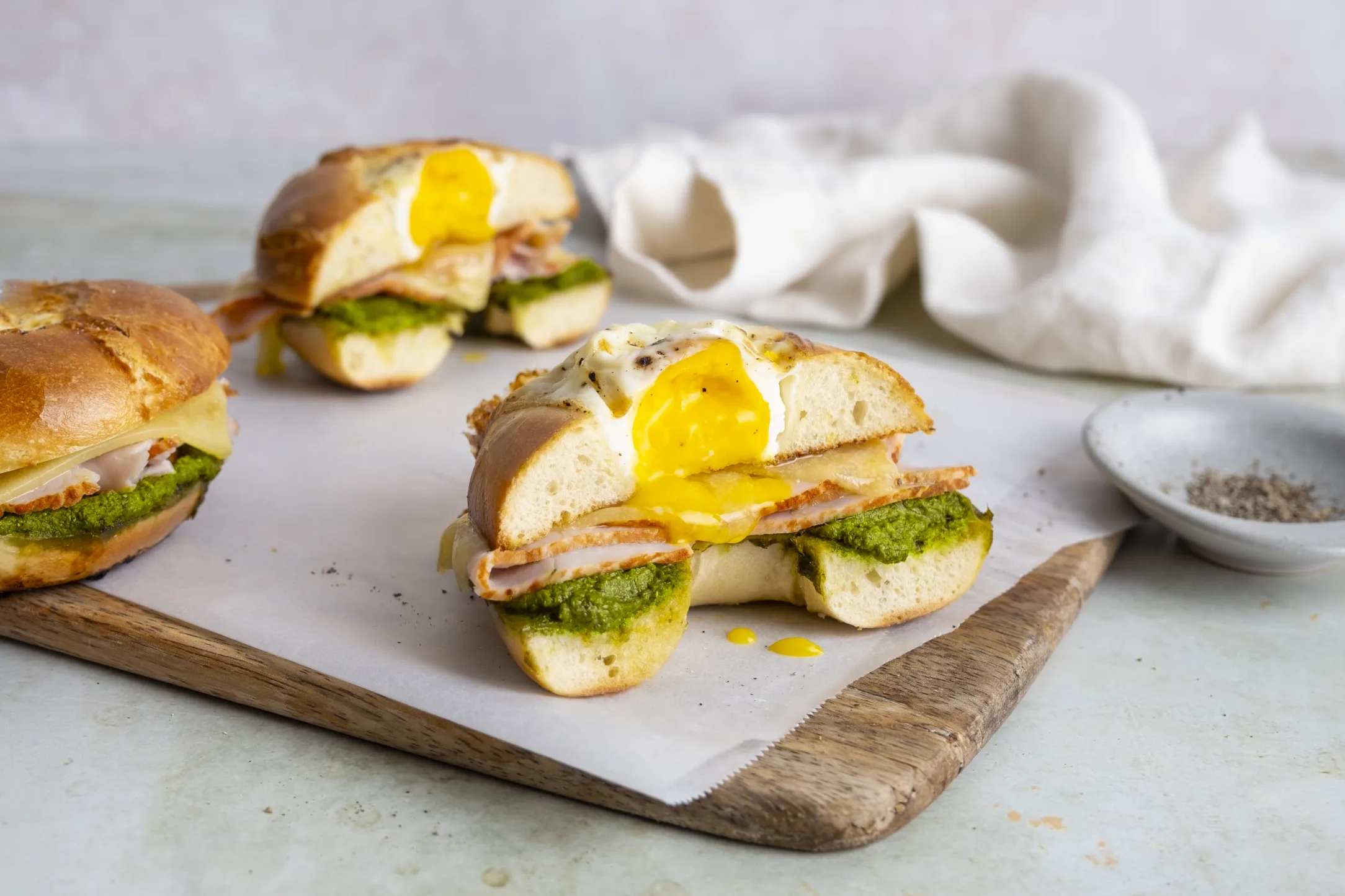 Breakfast Bagel with Pesto, Turkey Slices, Egg and Cheese