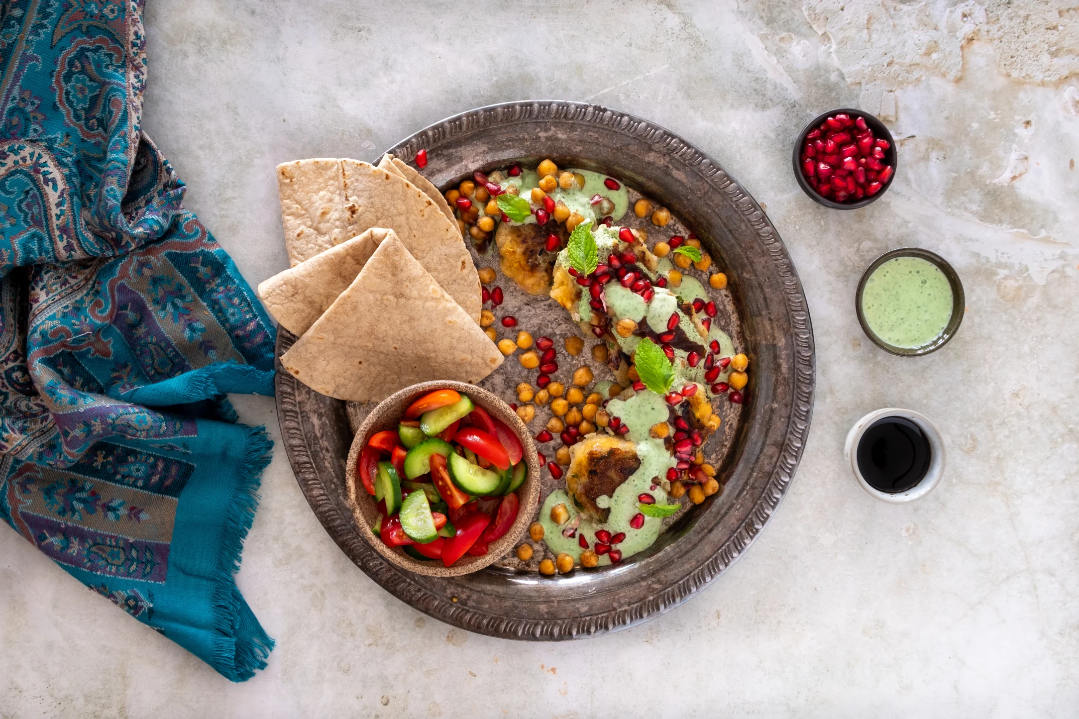 Aloo Tikki Chaat with Tamarind, Coriander Chutney and Spiced Chickpeas