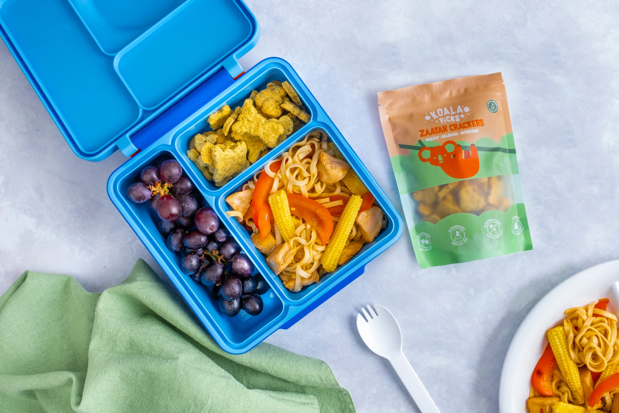 Sweet Chilli Chicken Noodles with Green Grapes and Koala Zaatar Crackers