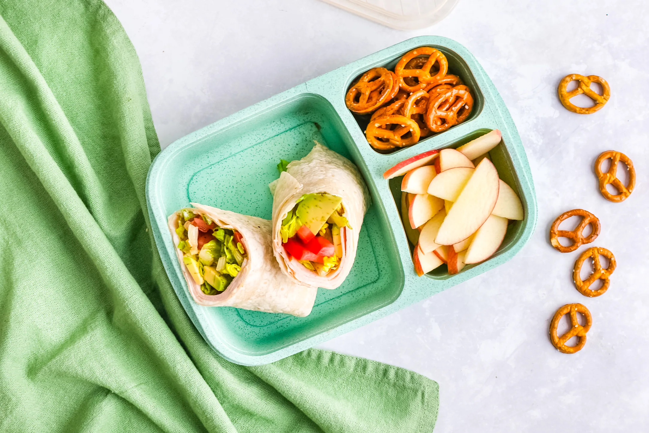 Turkey & Avocado Wrap with Crispy Pretzels & Apple Slices