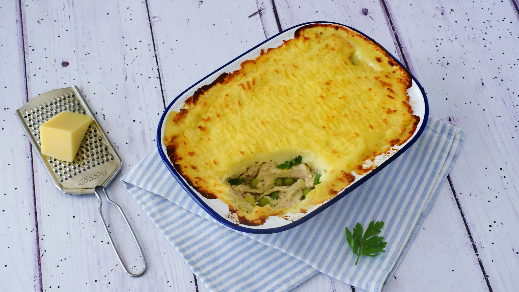 Creamy Chicken and Leek Pie with Peas and Parmesan