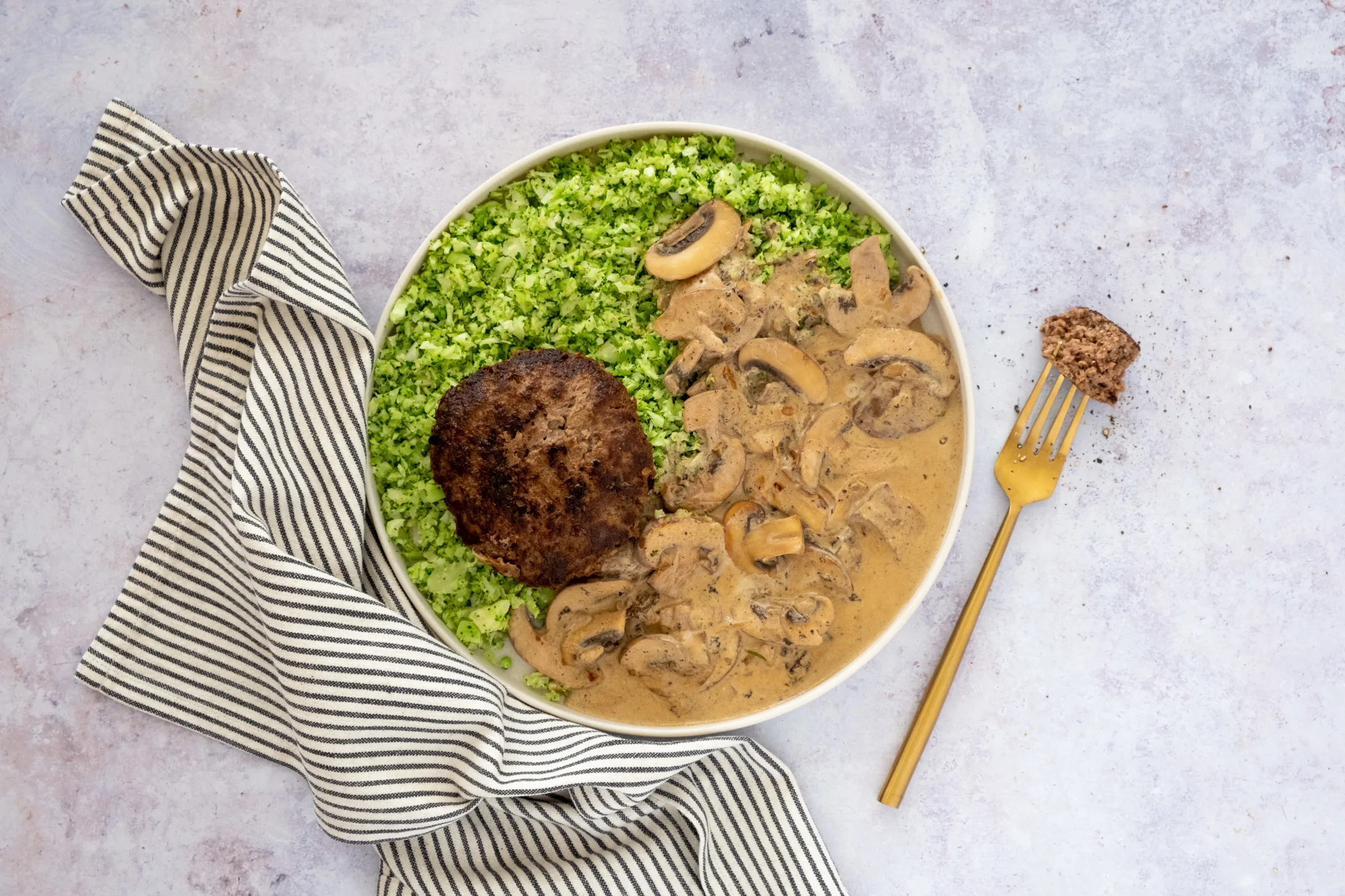 Beef Patties with Creamy Mushroom Sauce and Broccoli Rice