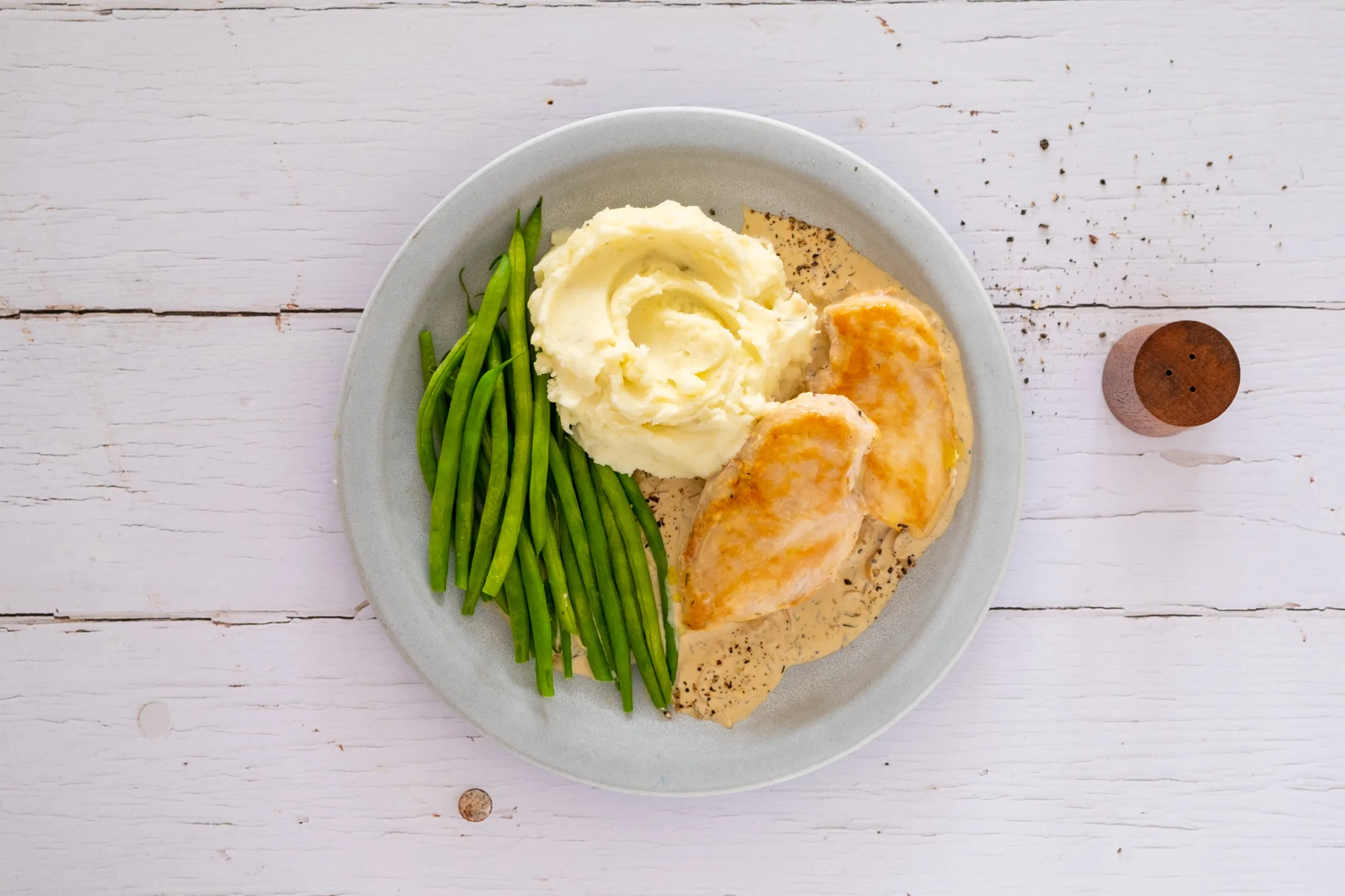 Chicken in Creamy Peppercorn Sauce with Potato Mash and Green Beans