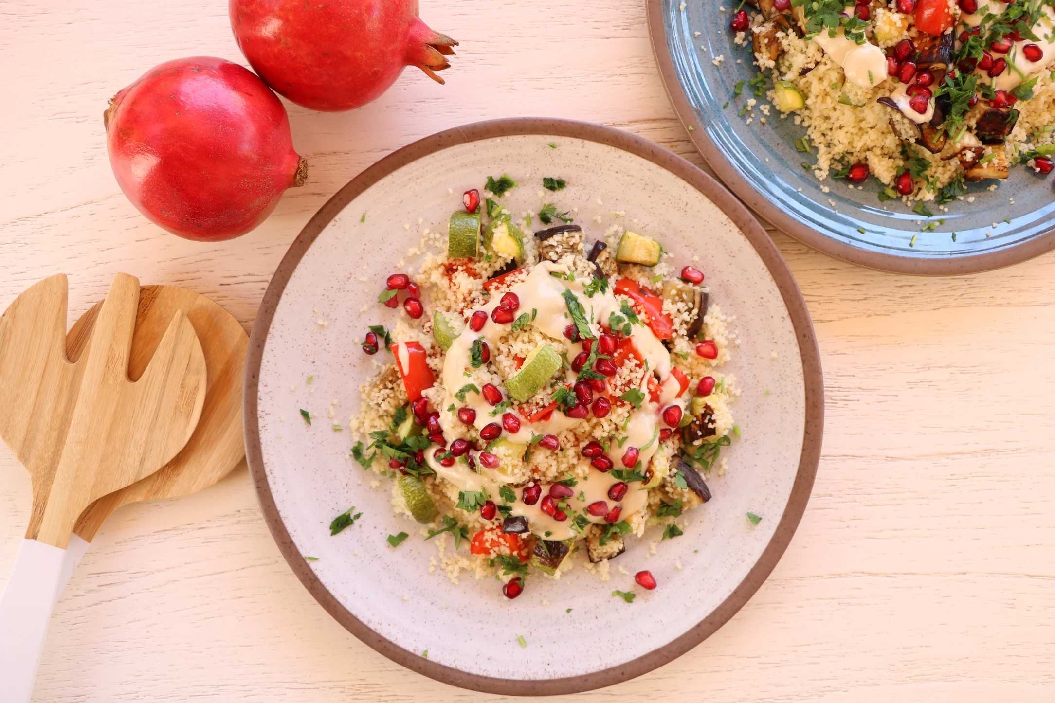 Roasted Vegetable and Couscous Salad with Thick Tahini Dressing and Pomegranate Seeds