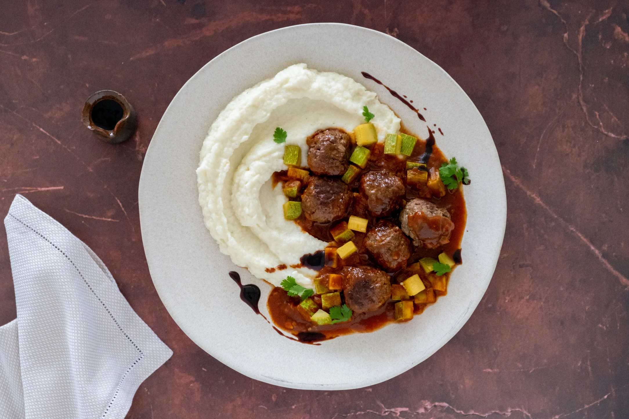 Daoud Basha, Lamb Meatballs in a Rich Tomato Sauce with Creamy Cauli Mash