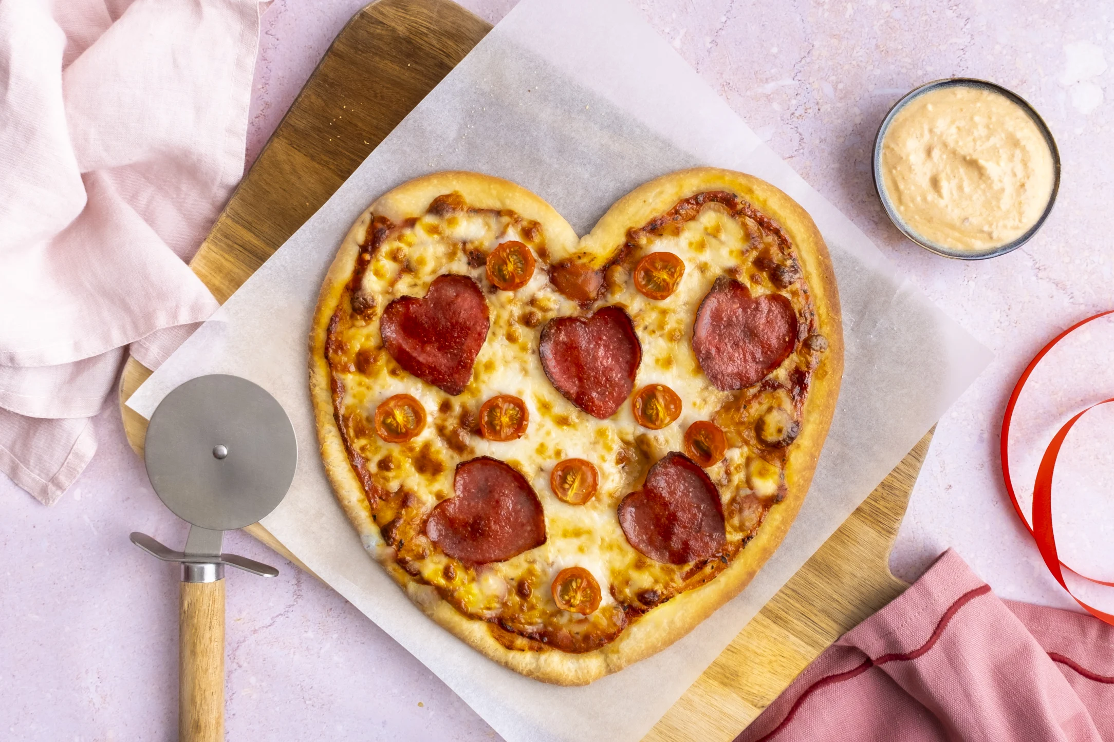Valentine's Day Pizza with Beef Pepperoni Hearts and Red Pesto Dip