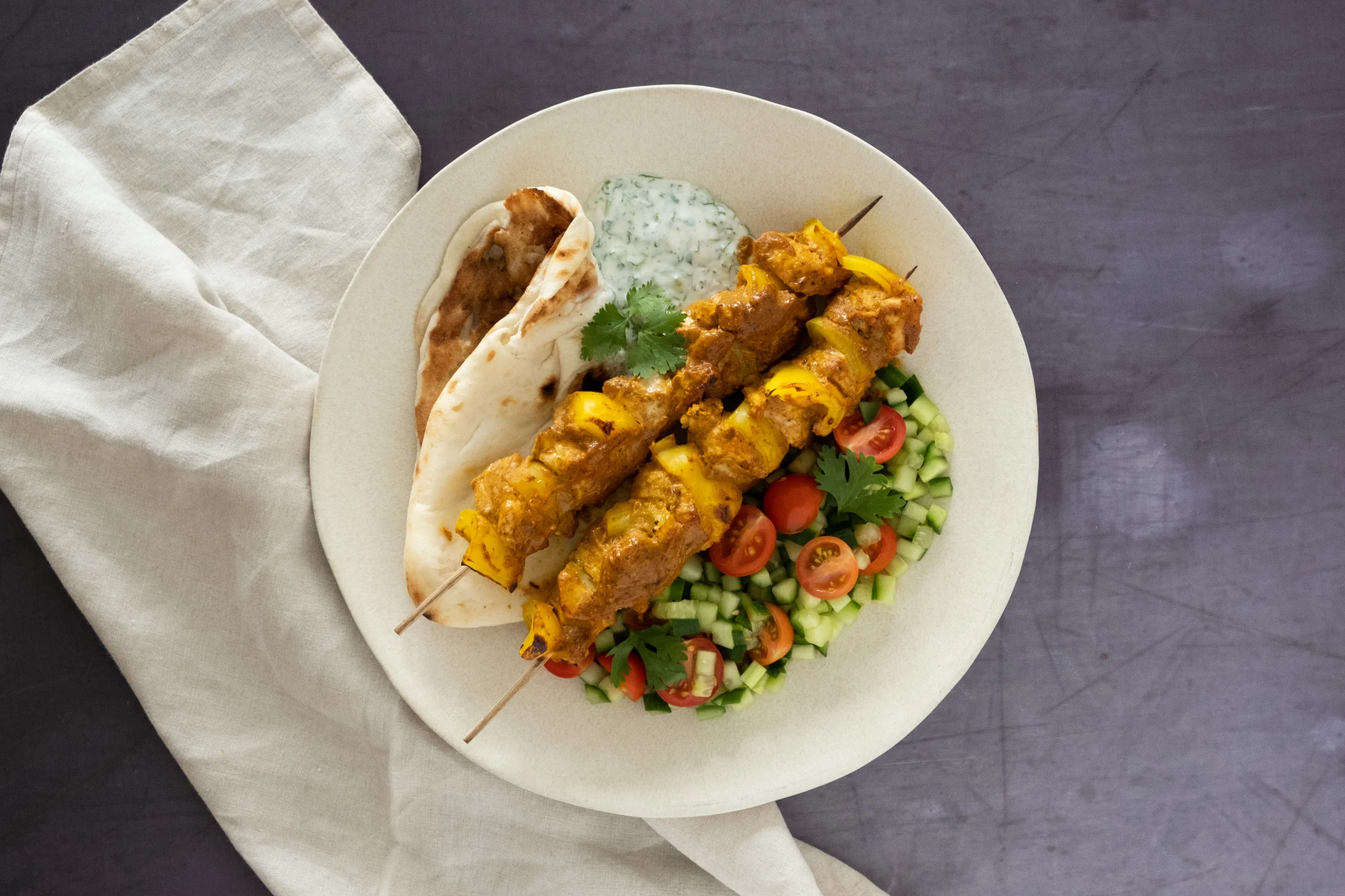 Tandoori Chicken Skewers with Naan and Kachumber Salad