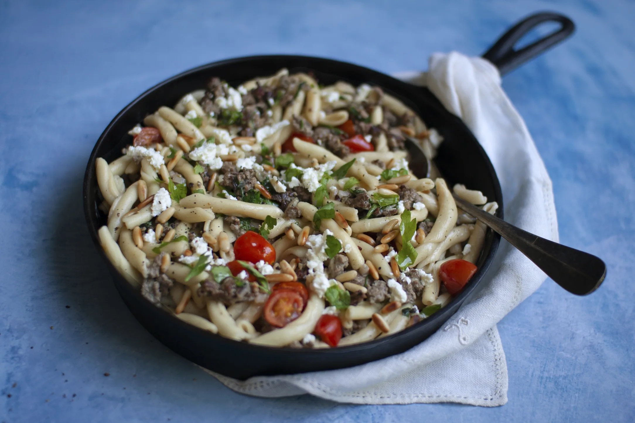 Creamy Lamb and Feta Skioufichta Pasta with Pine Nuts
