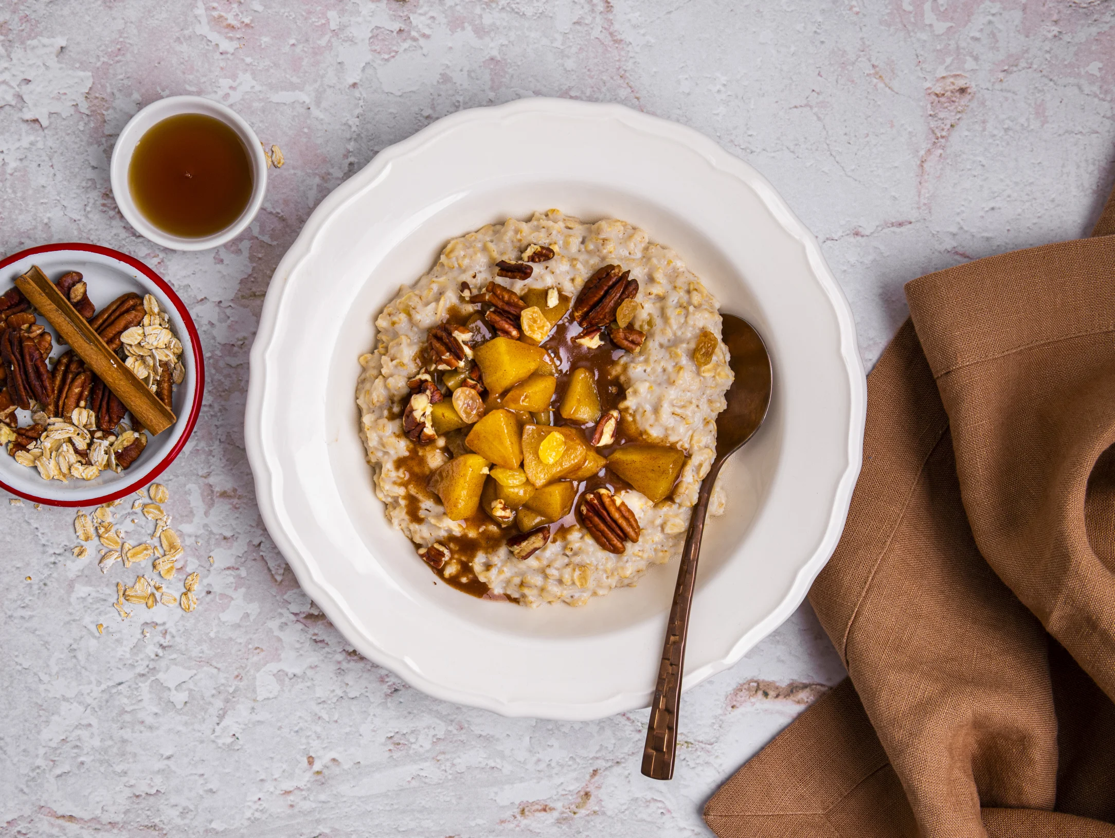 Hot Oatmeal Porridge with Maple Cinnamon Apples and Pecans