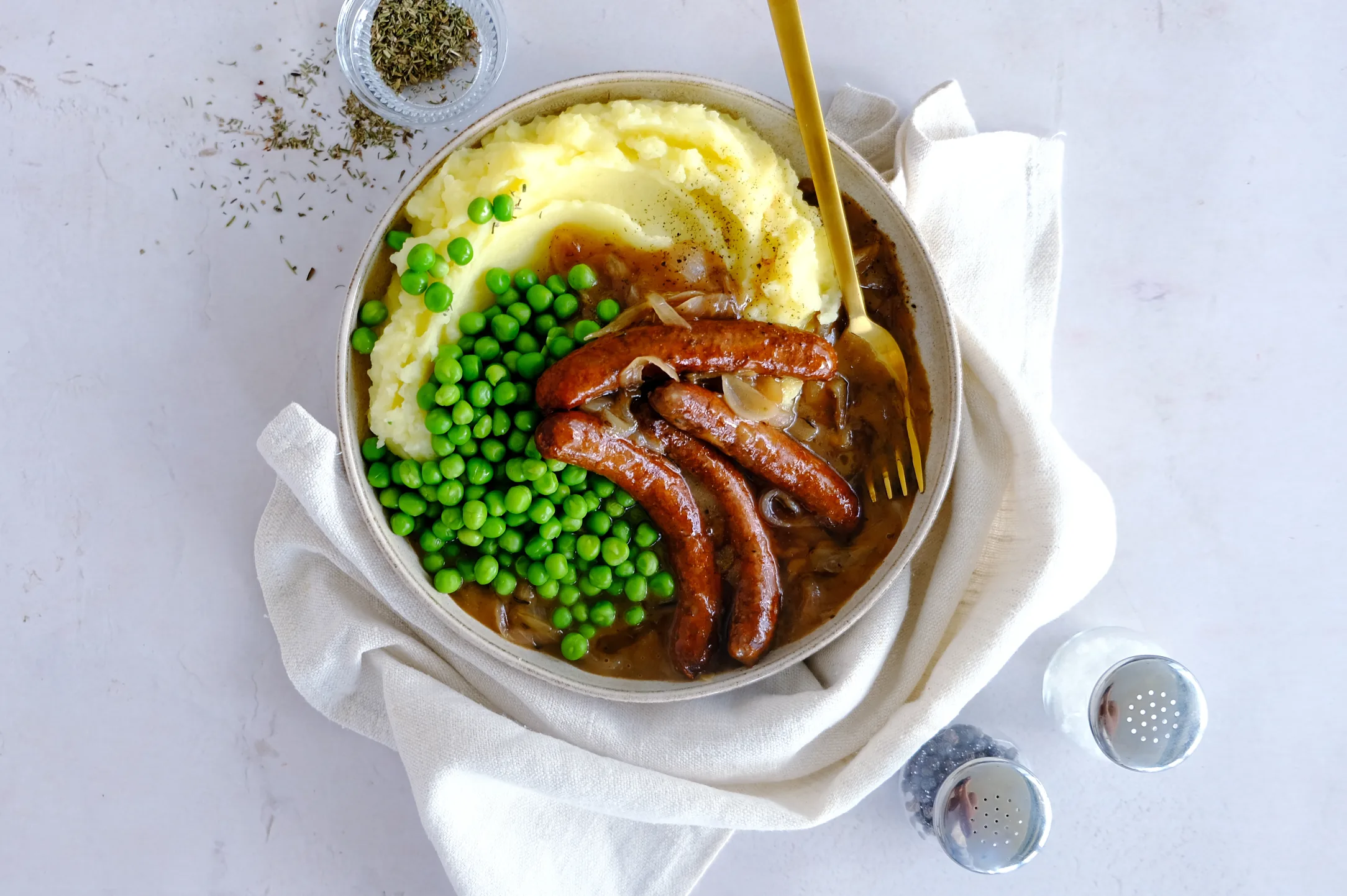 Beef Bangers and Mash with Onion Gravy and Peas