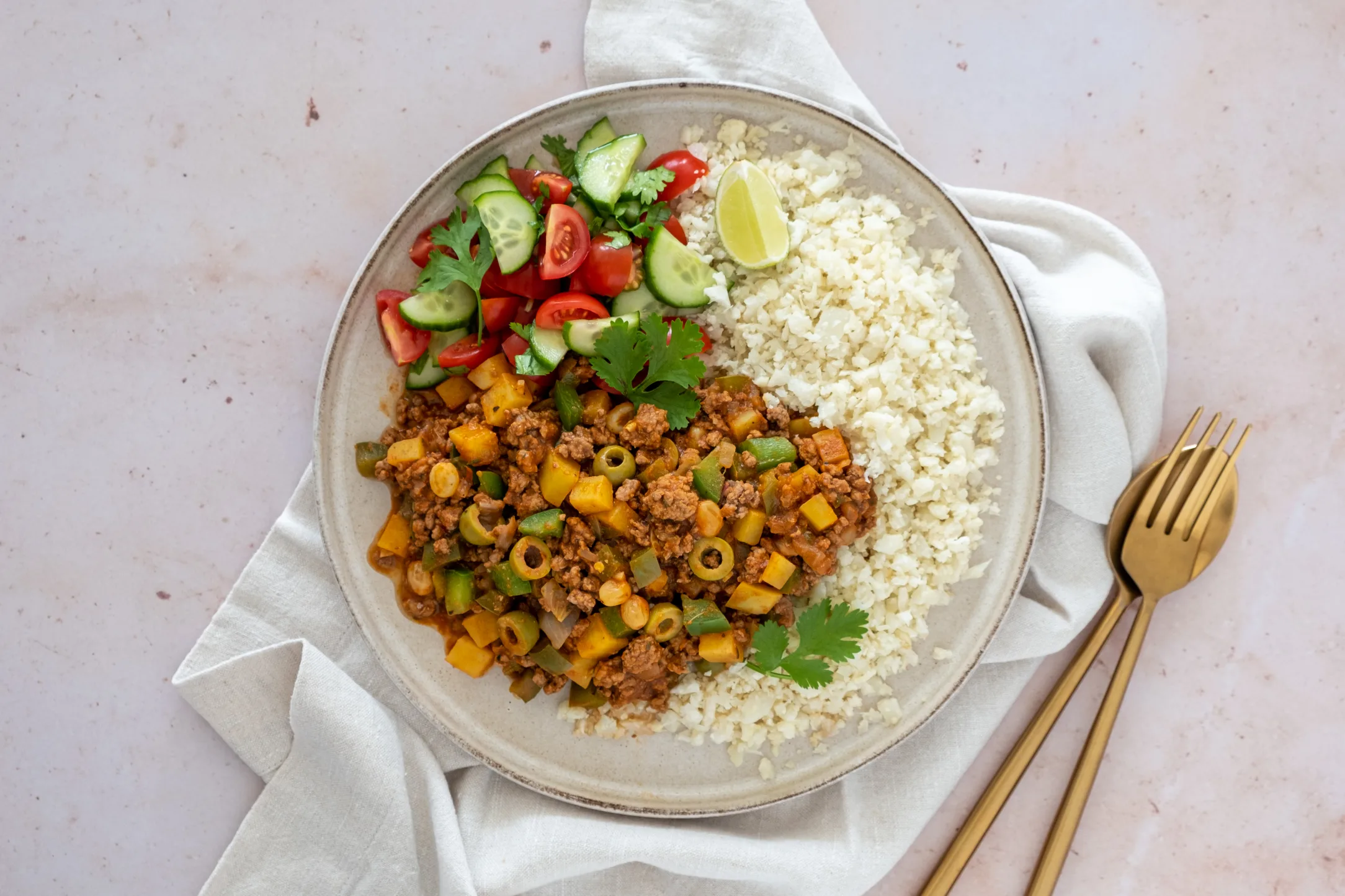 Beef Mince Stew and Cauliflower Rice with Cucumber and Cherry Tomato Salad