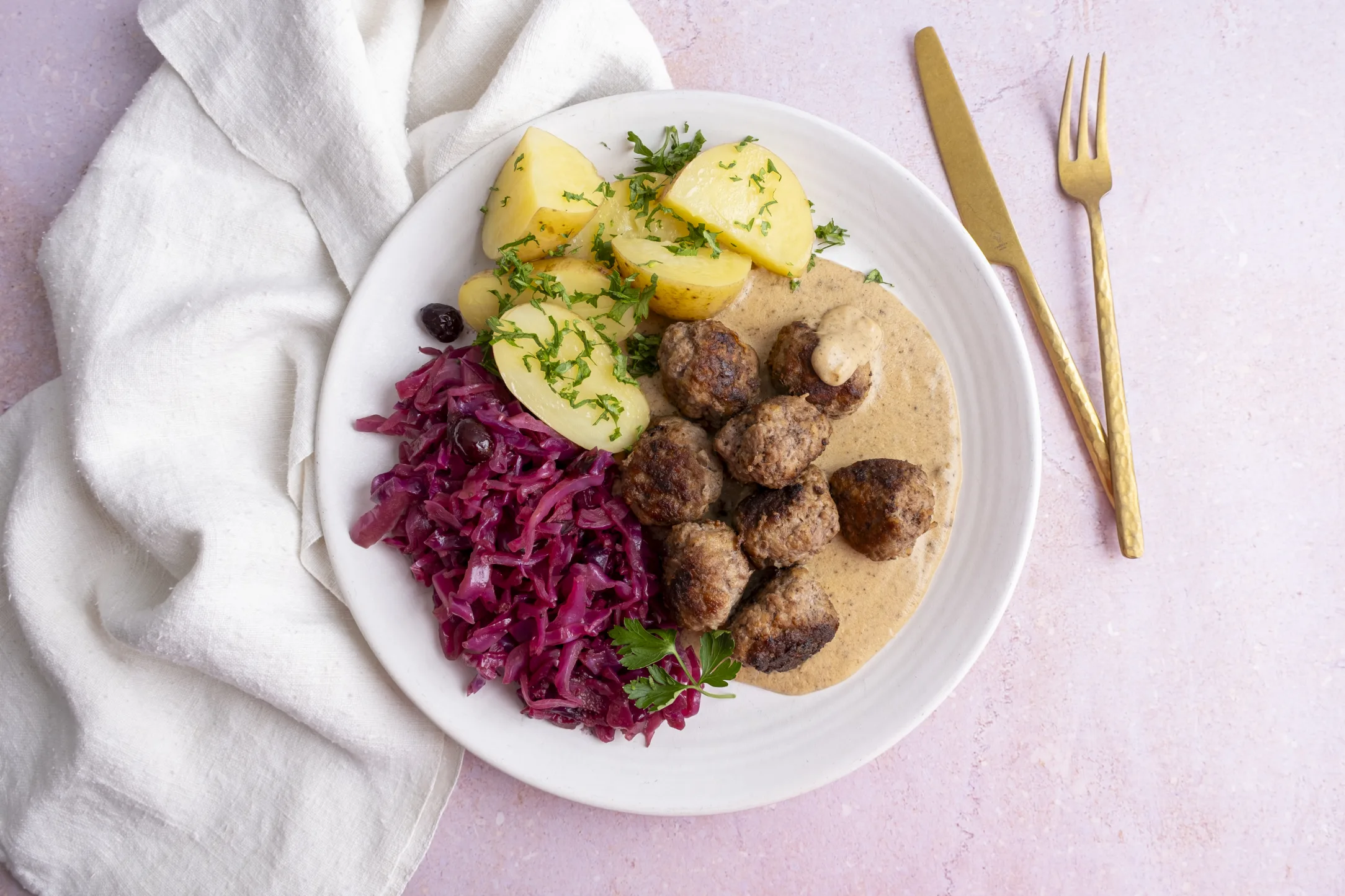 German Style Meatballs with Braised Red Cabbage, Potatoes and Gravy