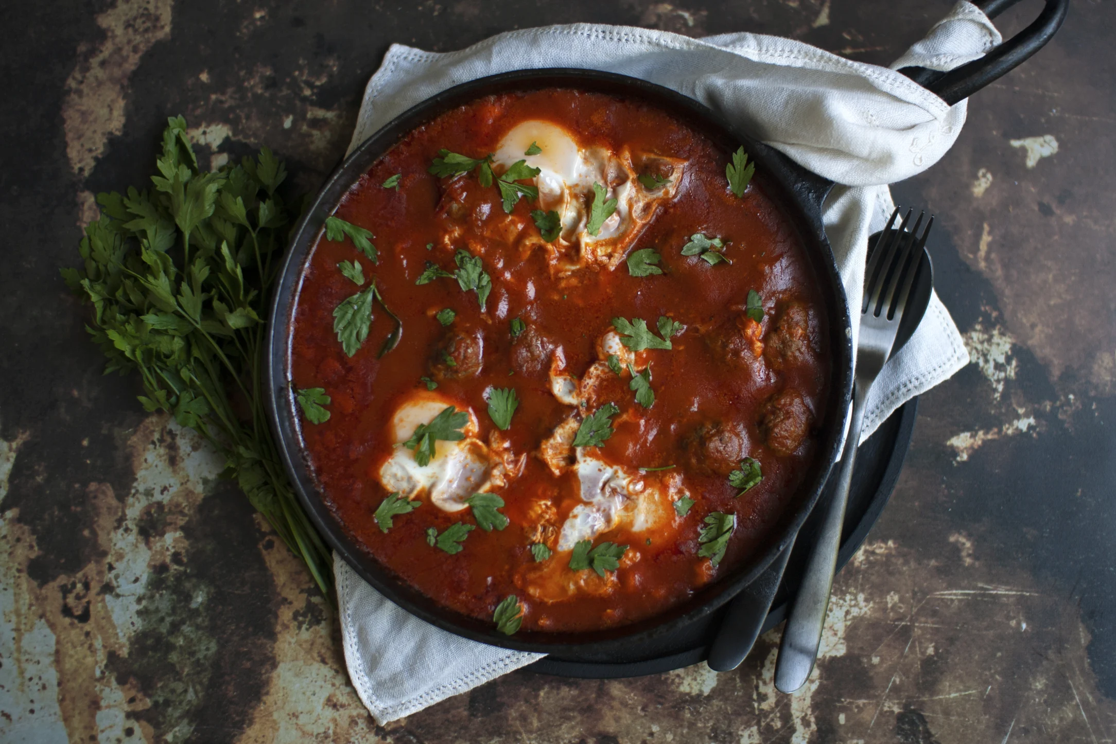 Meatball and Egg Shakshuka with Fresh Parsley