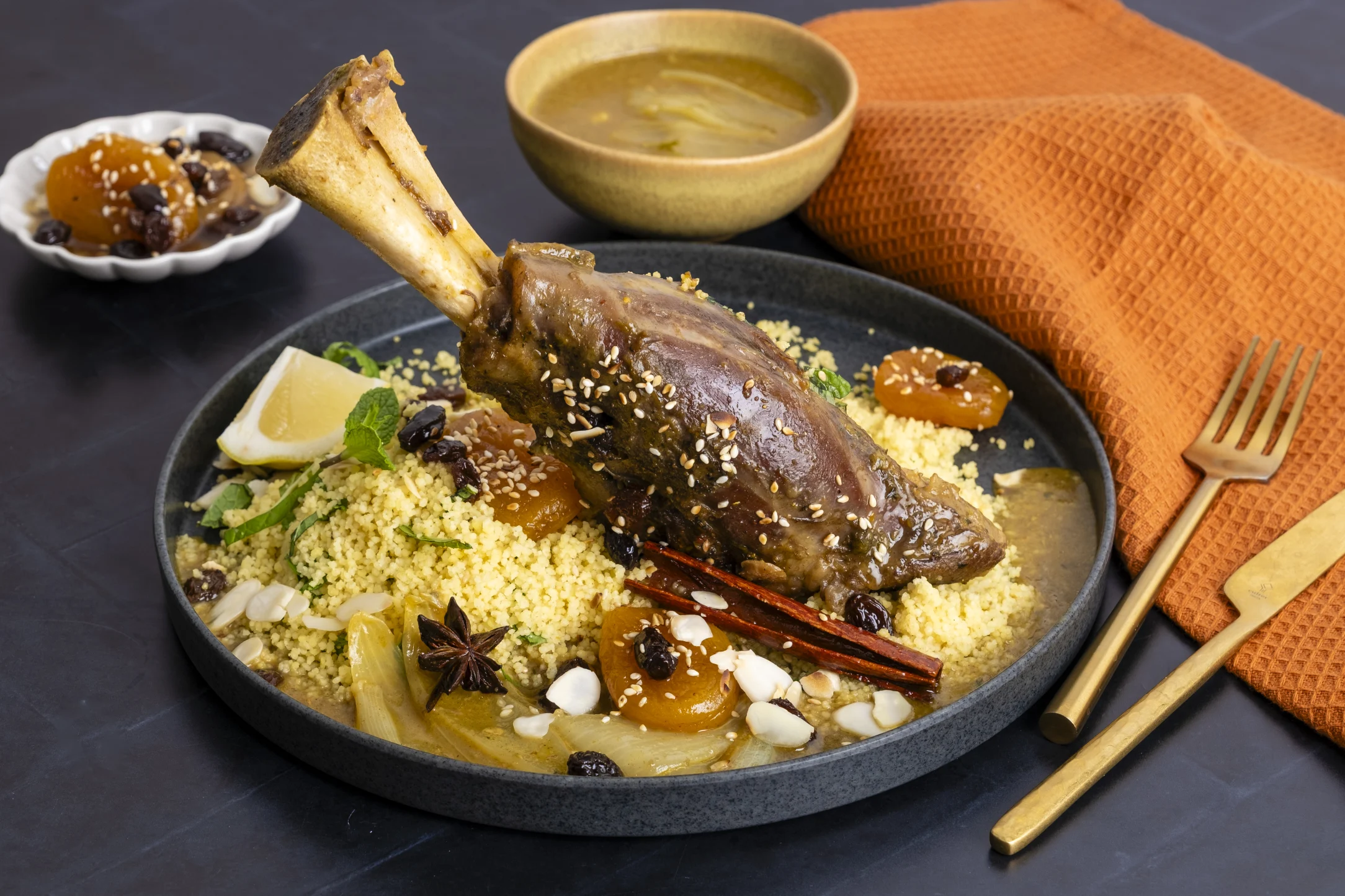 Moroccan Lamb Shank Tagine and Couscous Pilaf with Apricots and Almonds