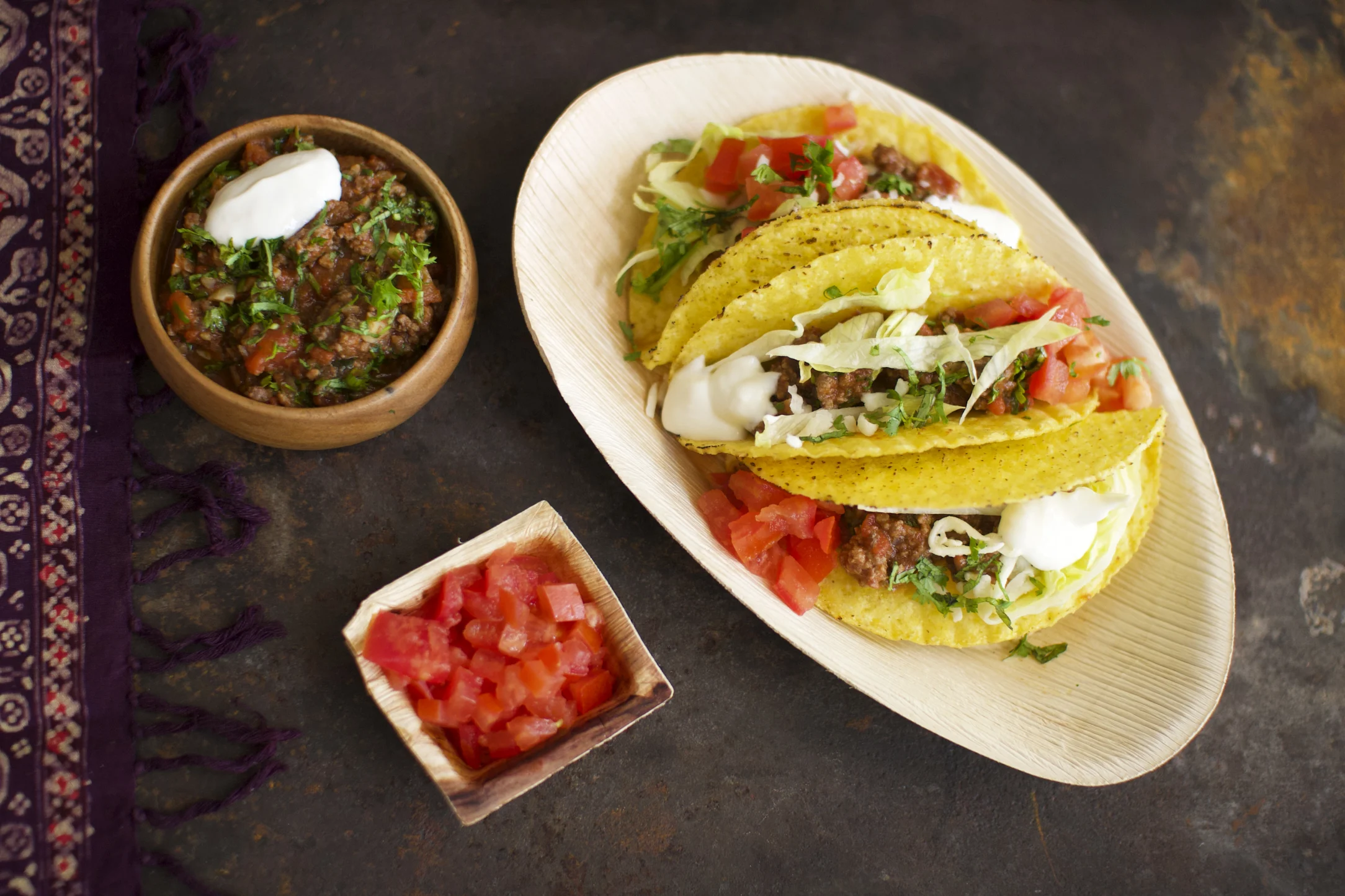Crispy Beef Tacos with Lettuce, Tomato and Cheese