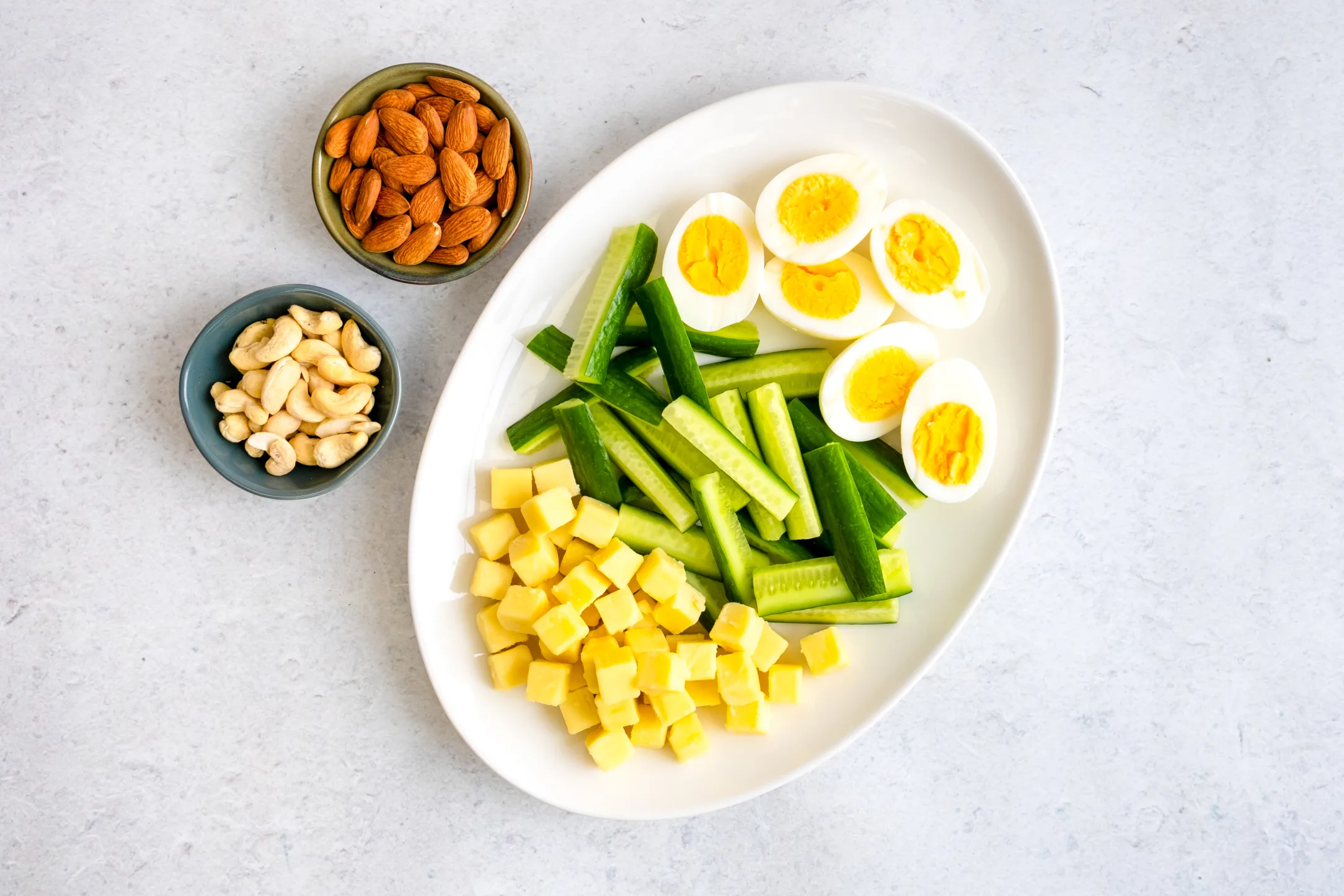 Snack Box: Protein Boost with Boiled Eggs, Cheddar Cubes, Cashews, Almonds and Cucumber