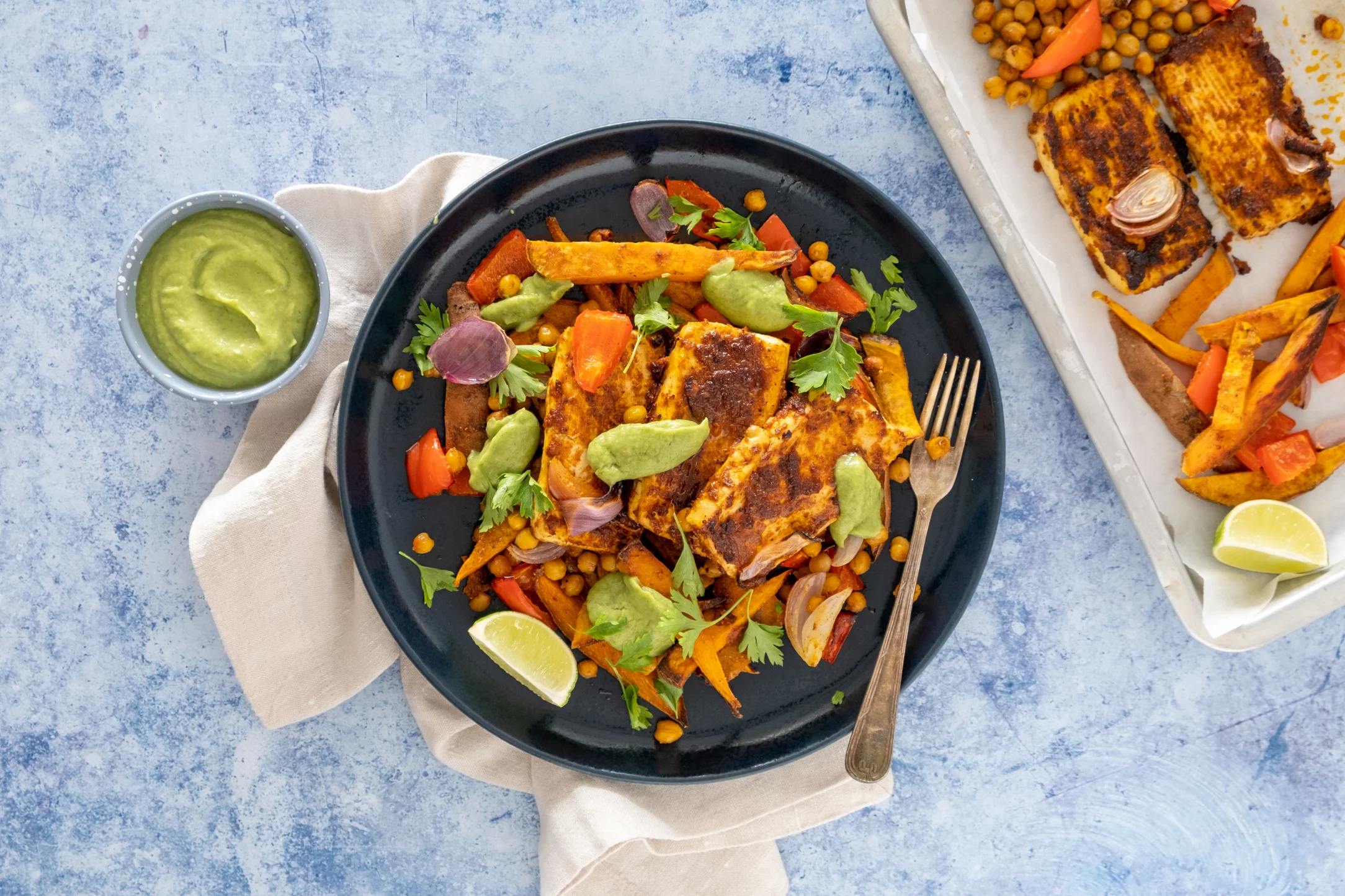 Roasted Tandoori Tofu and Vegetable Traybake with Crispy Chickpeas and Avocado Herb Chutney