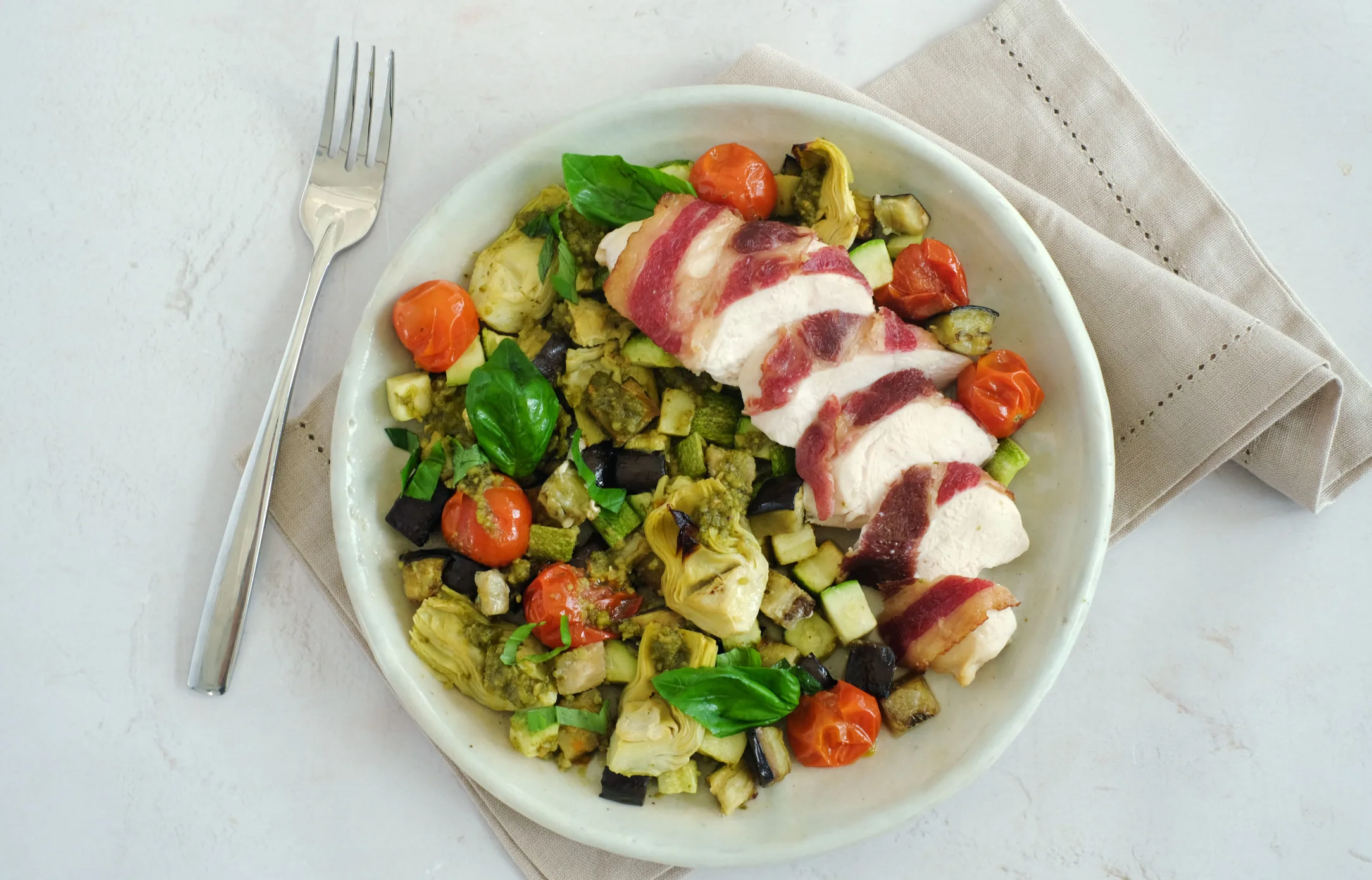 Bacon Wrapped Chicken with Warm Pesto Vegetables