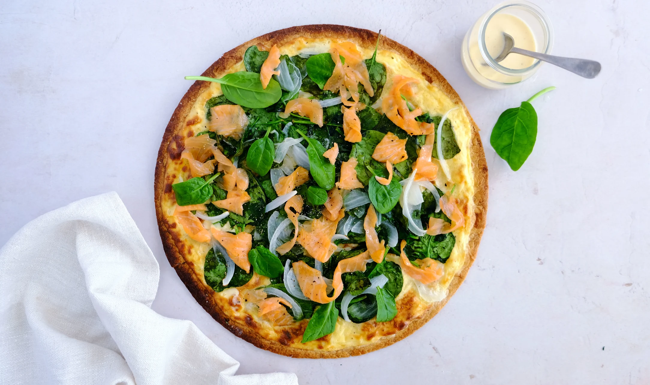 Salmon 'Flammenkuchen' with Sour Cream and Spinach