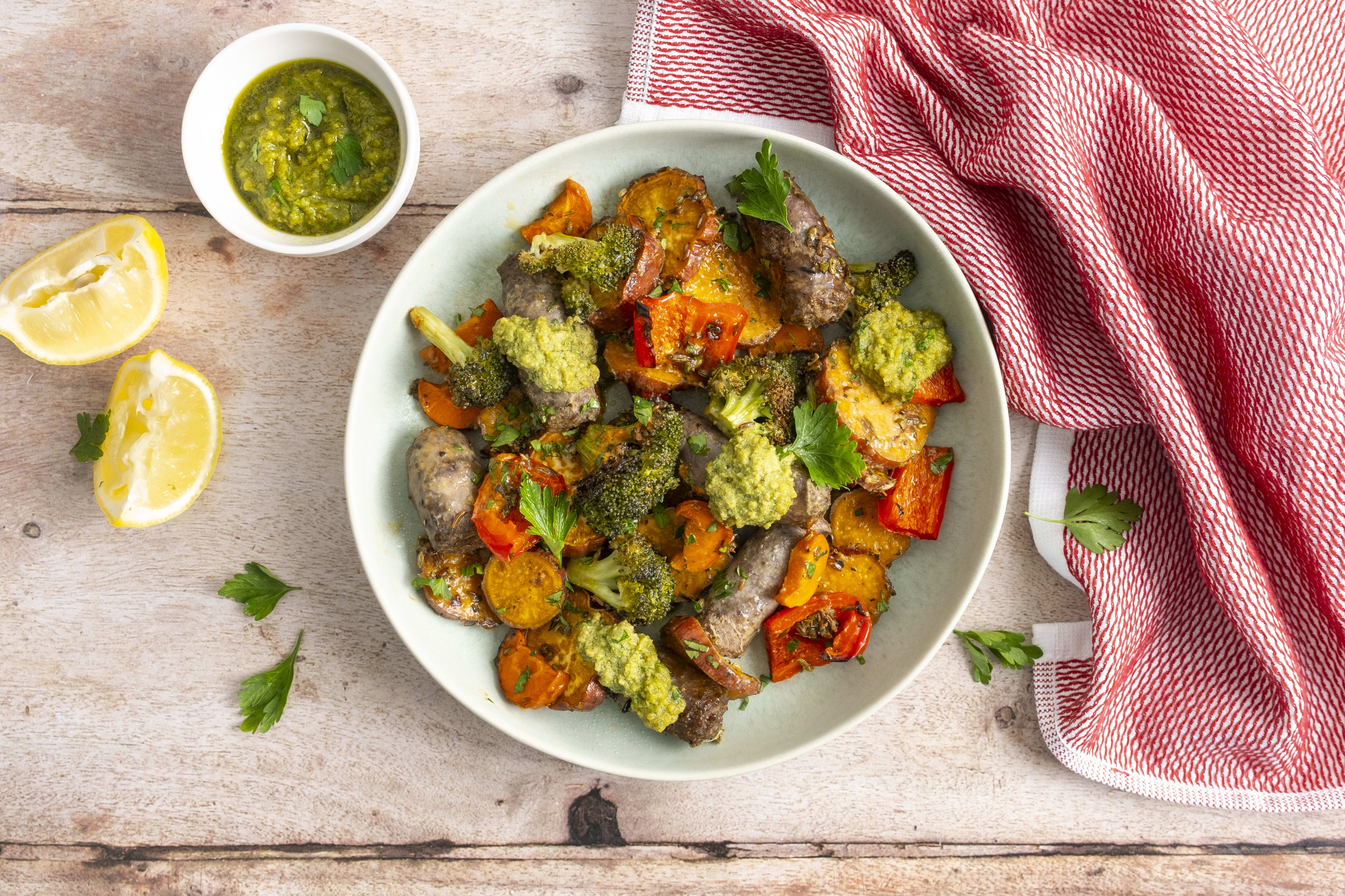 Italian Sausage & Vegetable Traybake with Green Pesto Dressing