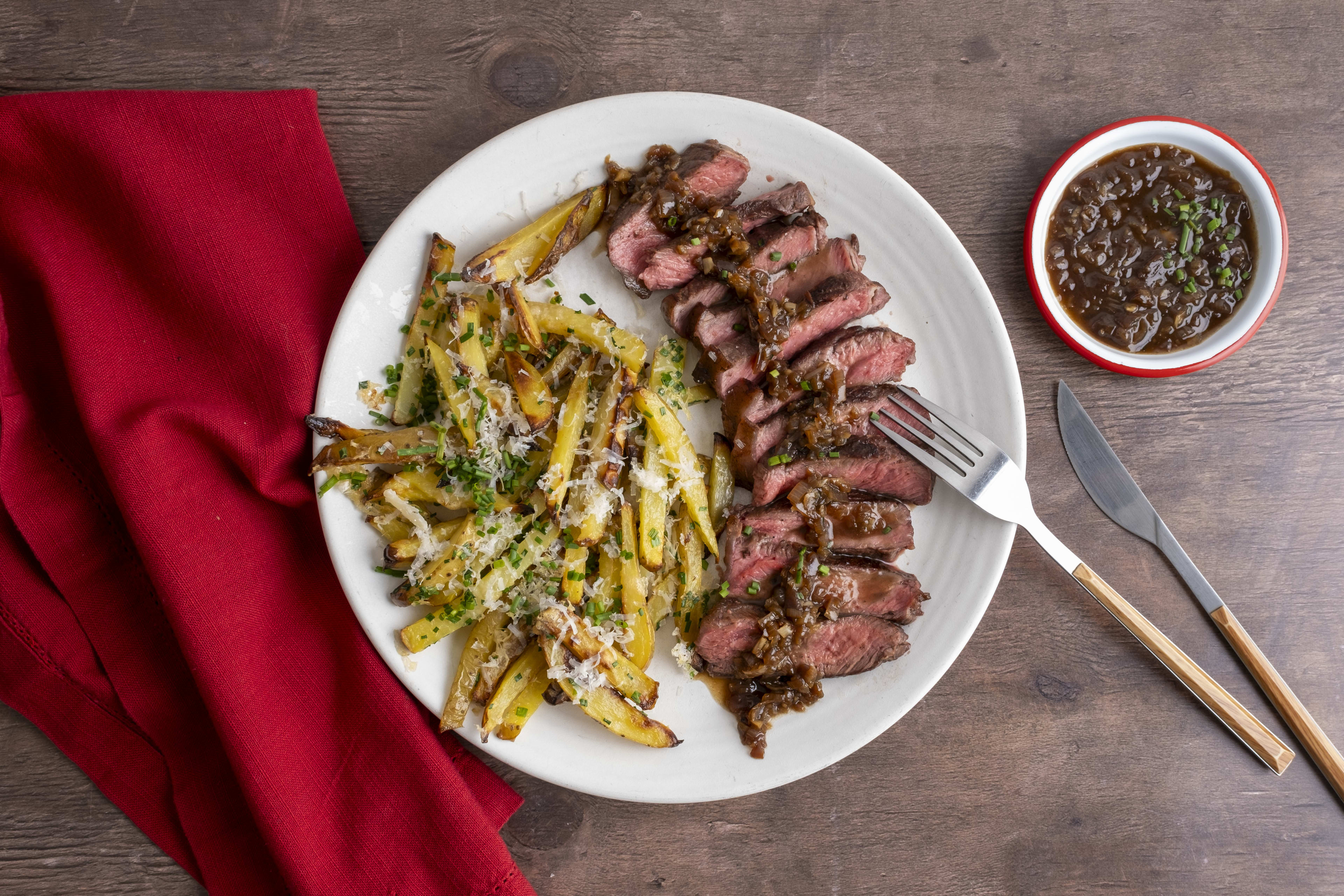 Sirloin Steak with Parmesan Truffle Fries & Caramelised Onion Sauce