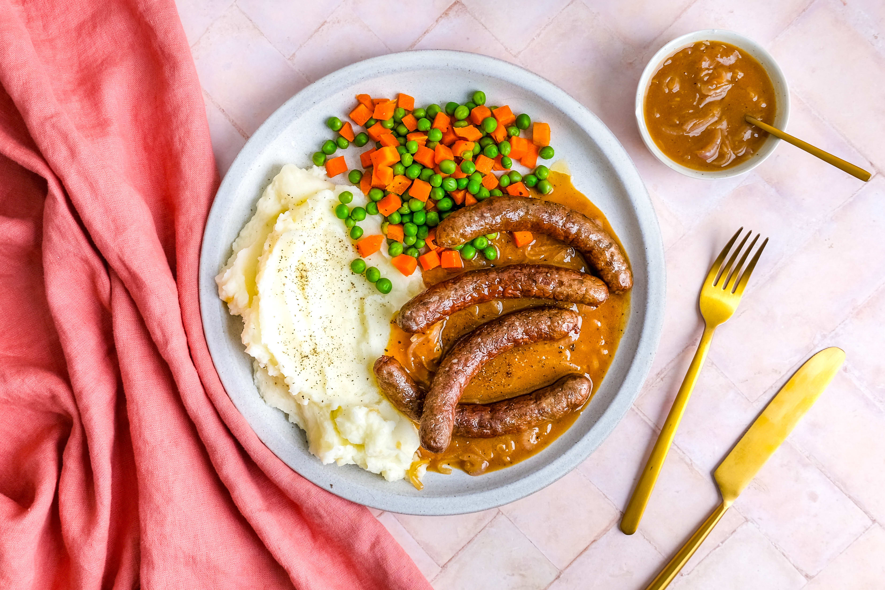 Classic Beef Sausages & Mash with Onion Gravy & Mixed Veg