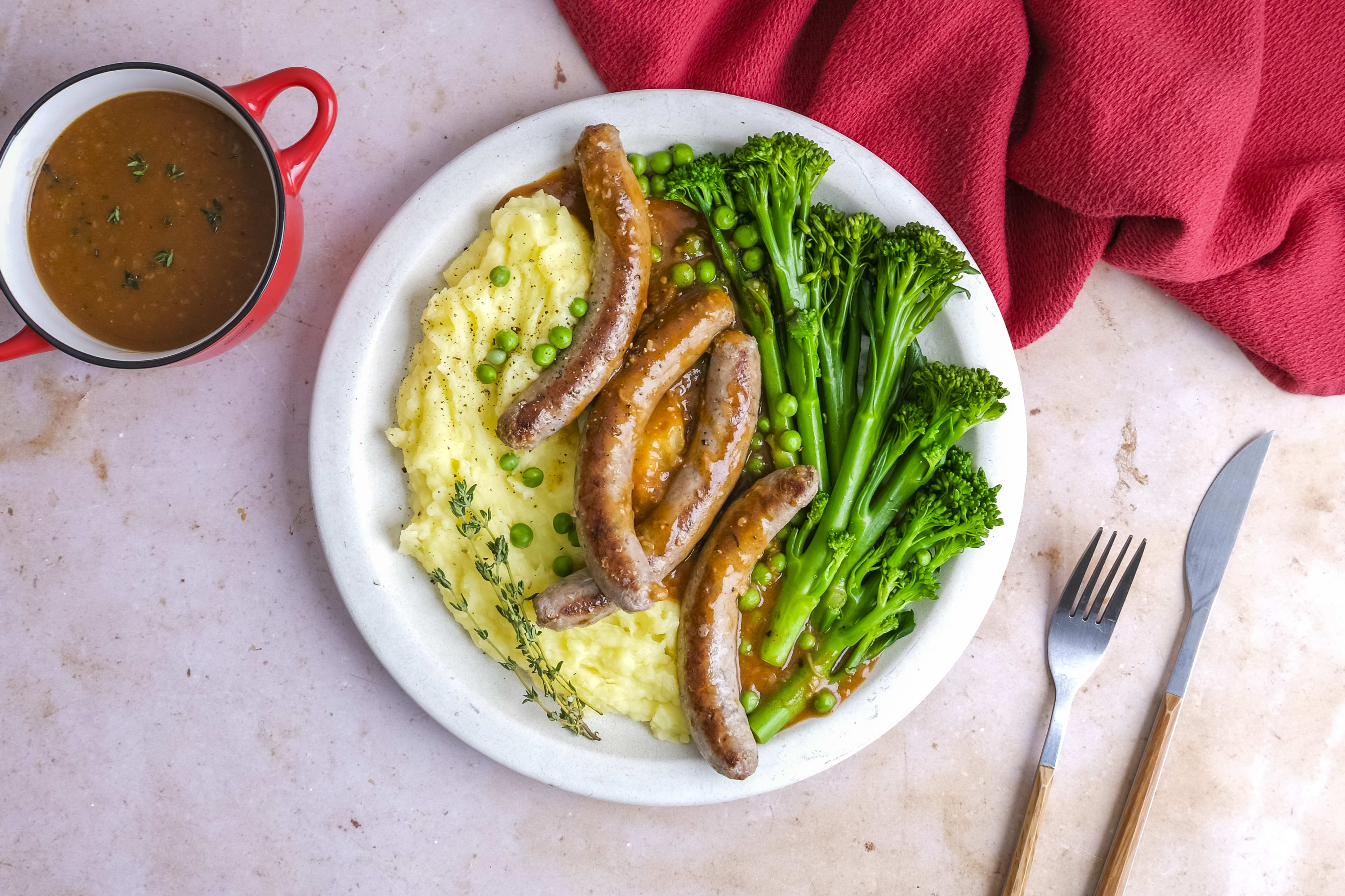 Lamb & Rosemary Sausages with Mashed Potatoes, Green Veg, & Gravy