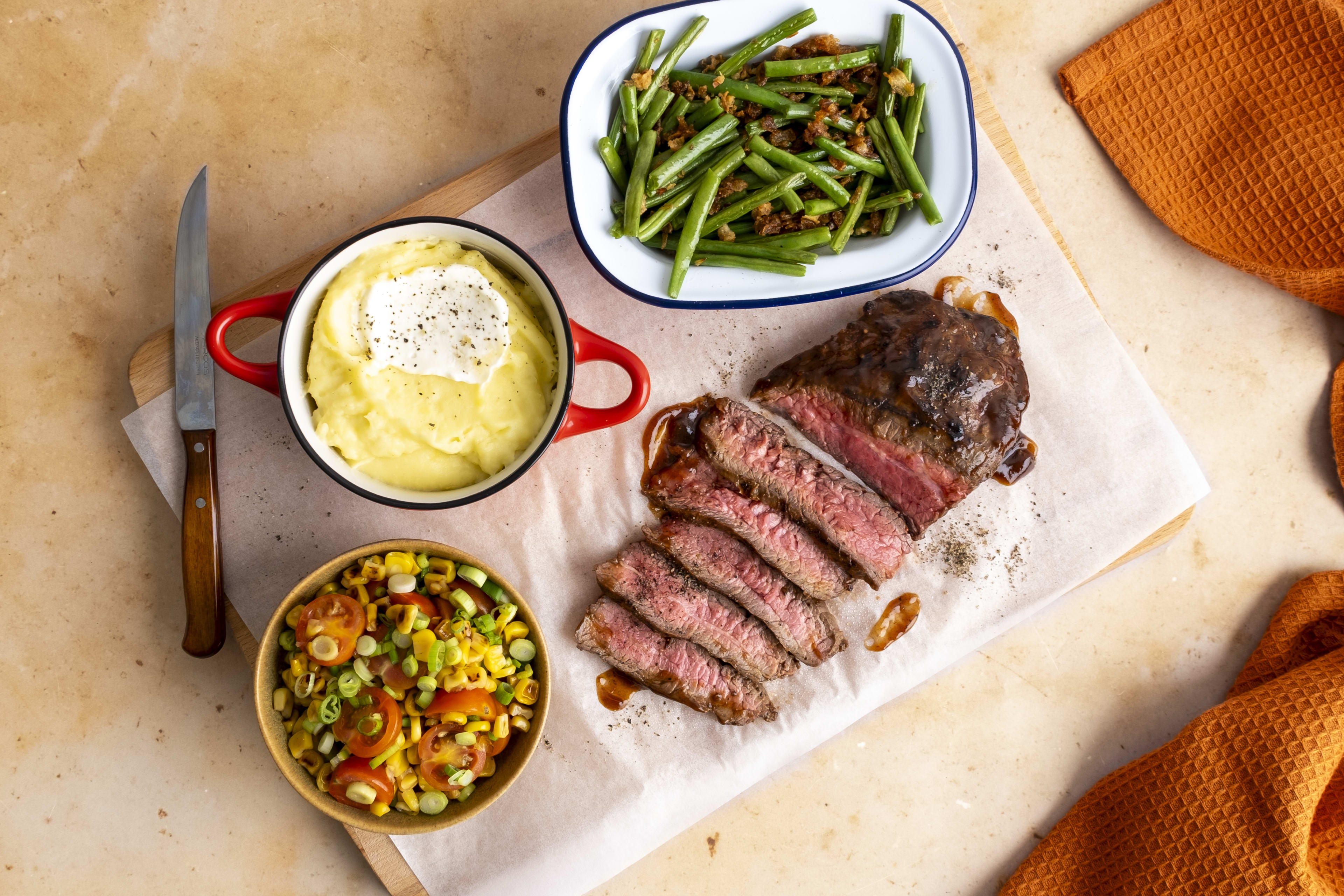BBQ Sirloin Steak with Sour Cream Mash Green Beans & Charred Corn Salad