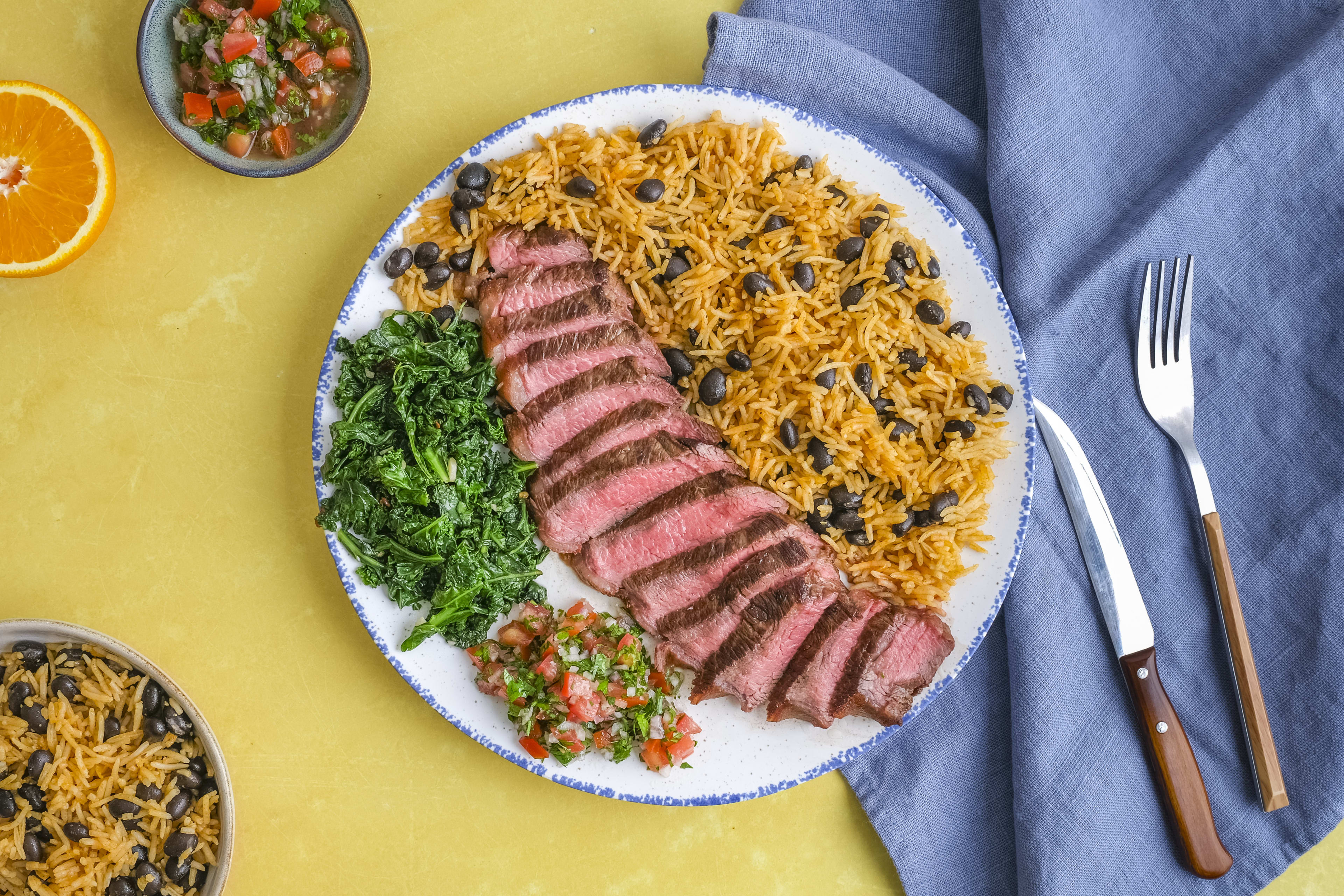 Picanha Steak with Black Bean Rice, Garlicky Kale & Orange Vinaigrette