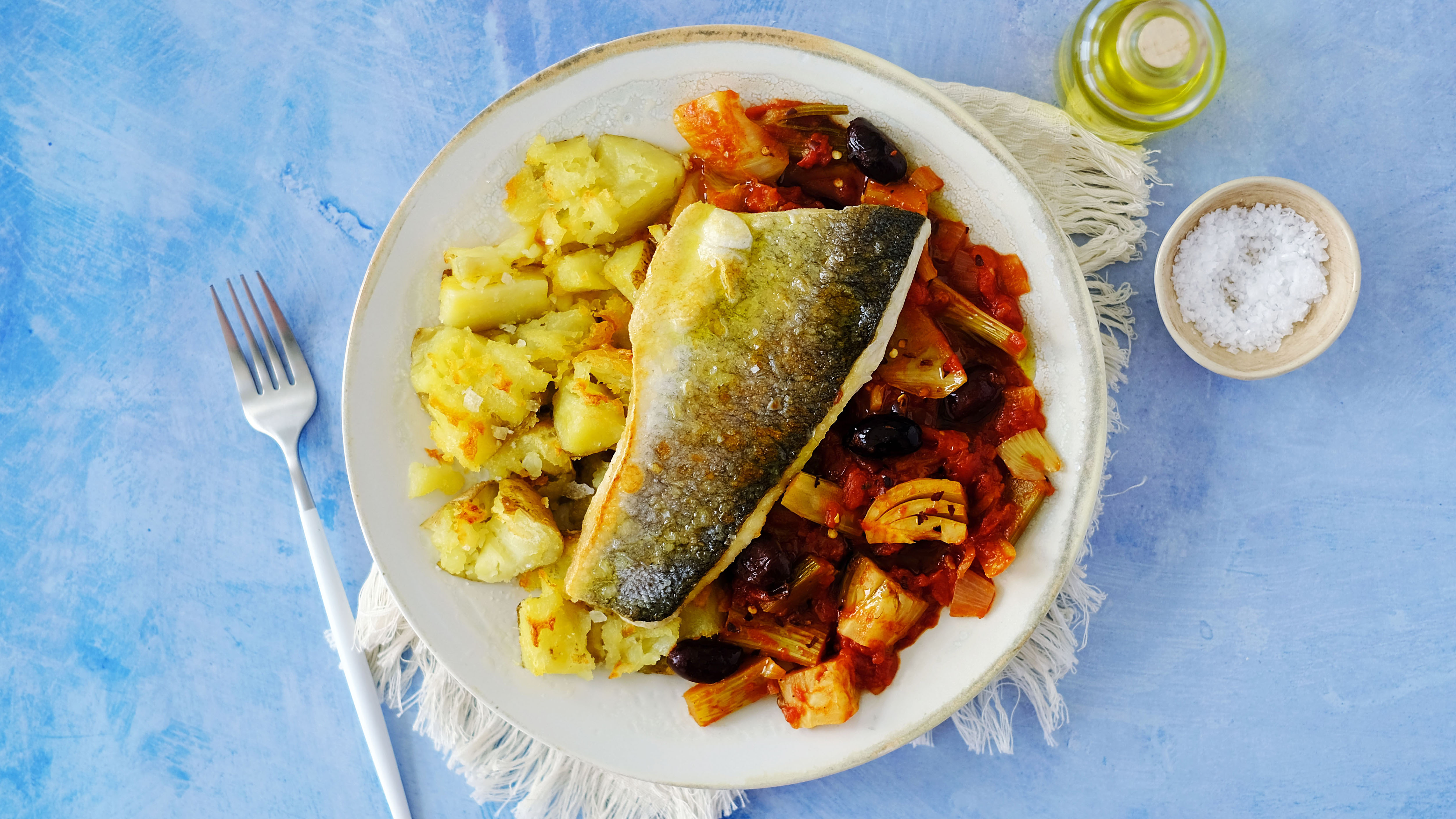 Sea bass with Mediterranean Fennel and Tomato Stew and Crushed Potatoes