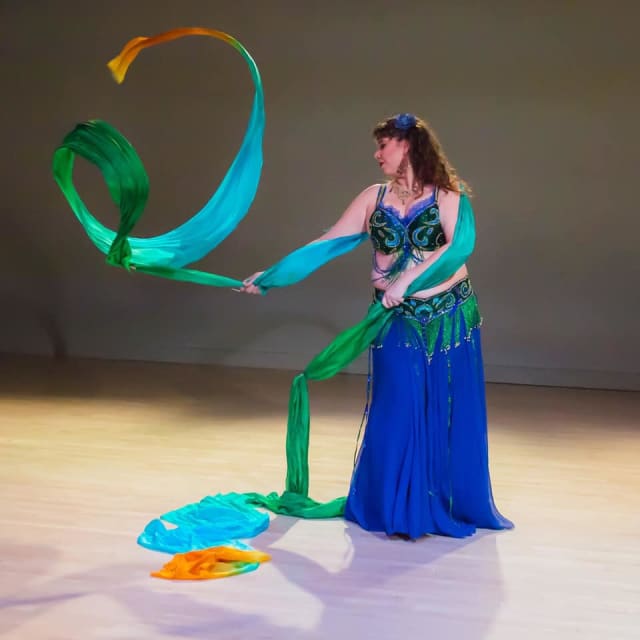 woman with a twenty foot silk ribbon