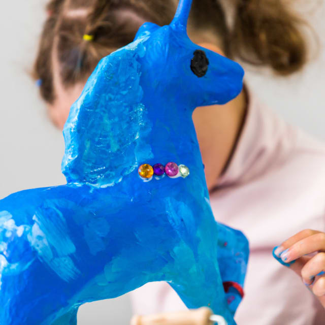 blue paper mache horse