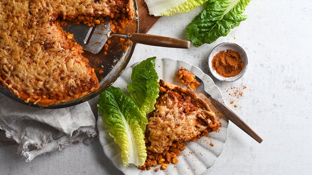 Tacopaj med röda linser och osttäcke