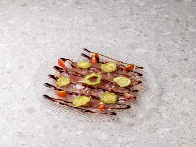 鮮魚のカルパッチョ ゴーヤのフリットと共に