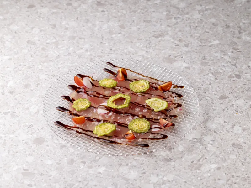 鮮魚のカルパッチョ ゴーヤのフリットと共に