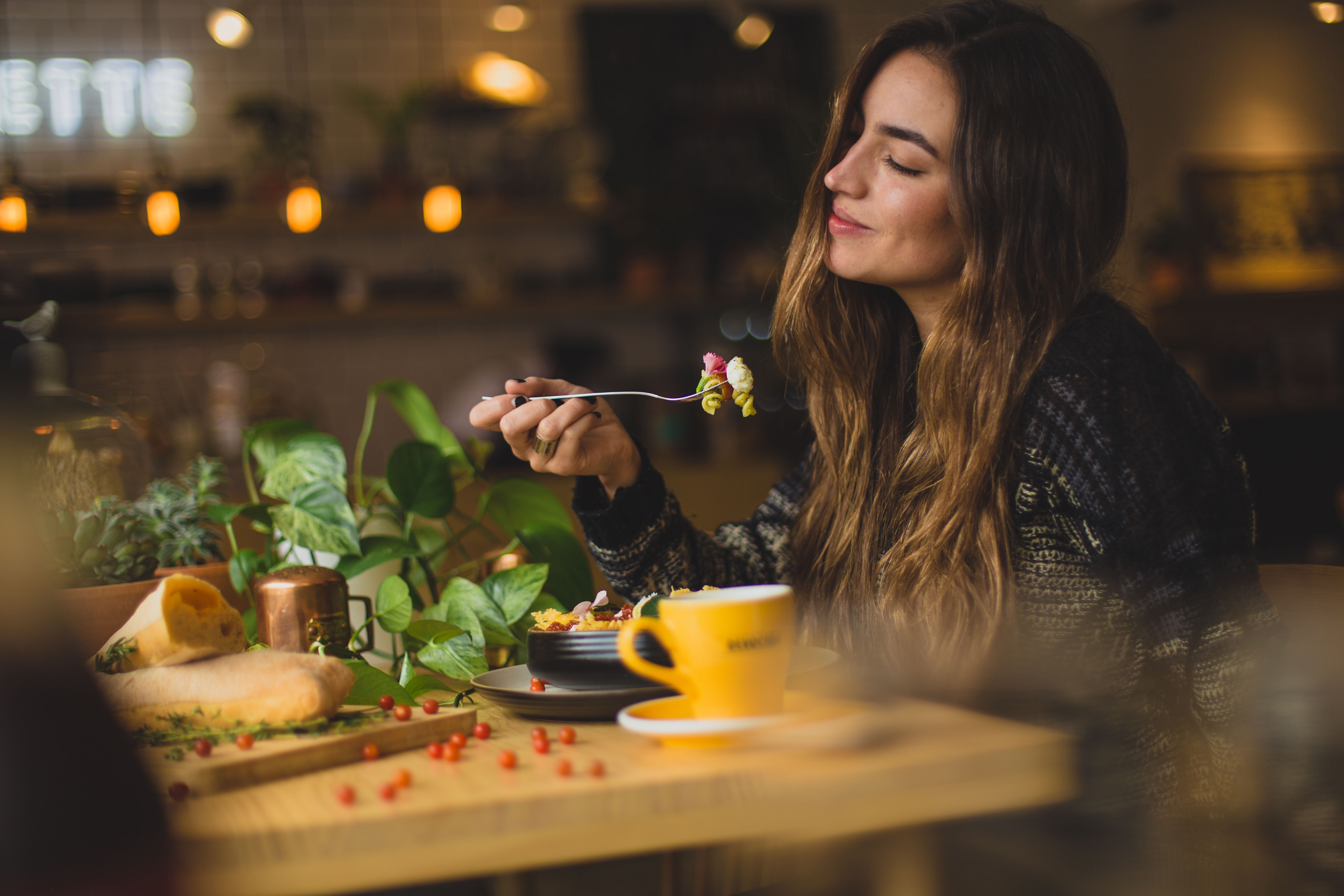 a woman enjoying a treat