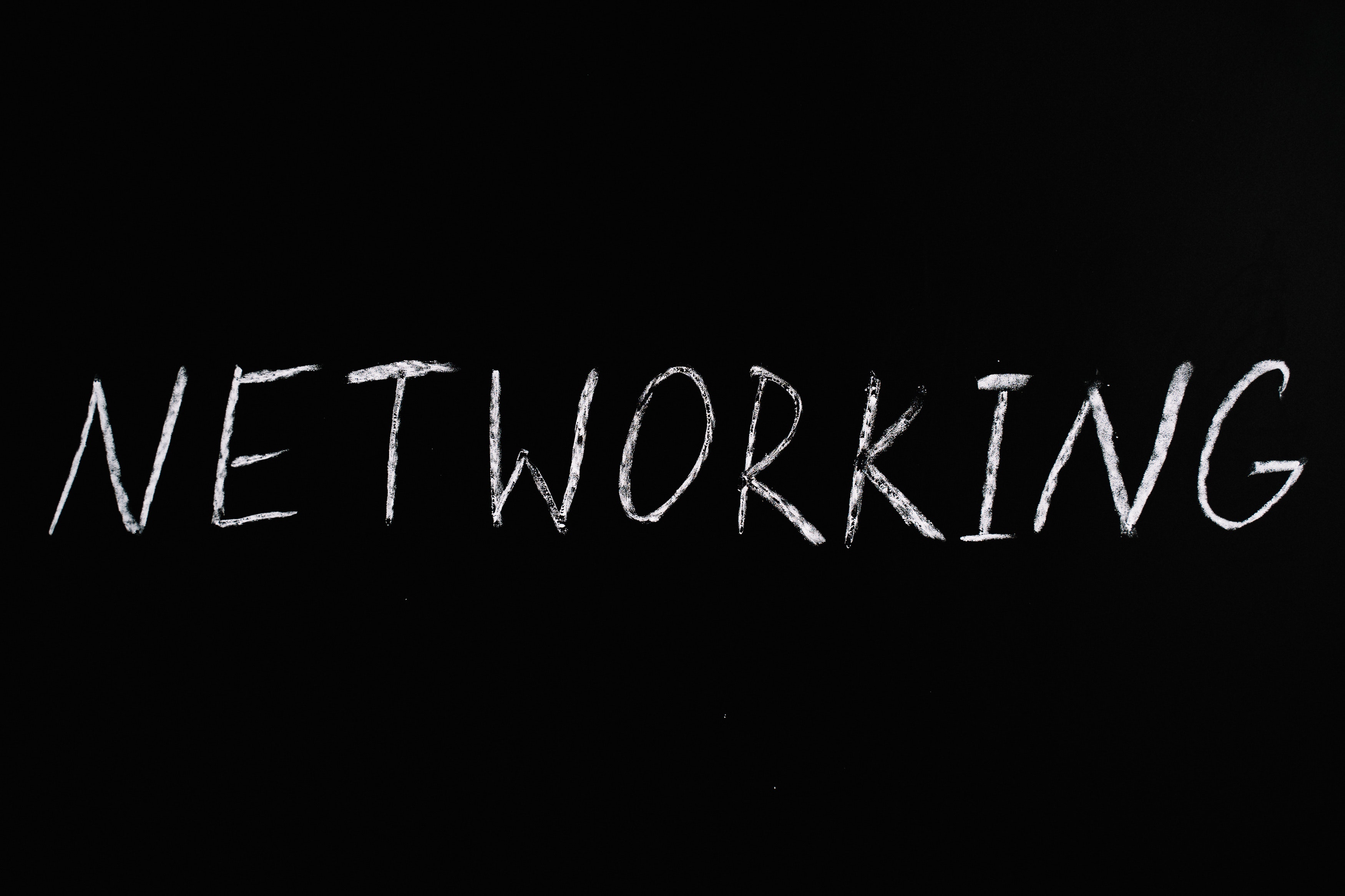 a blackboard with networking written on it