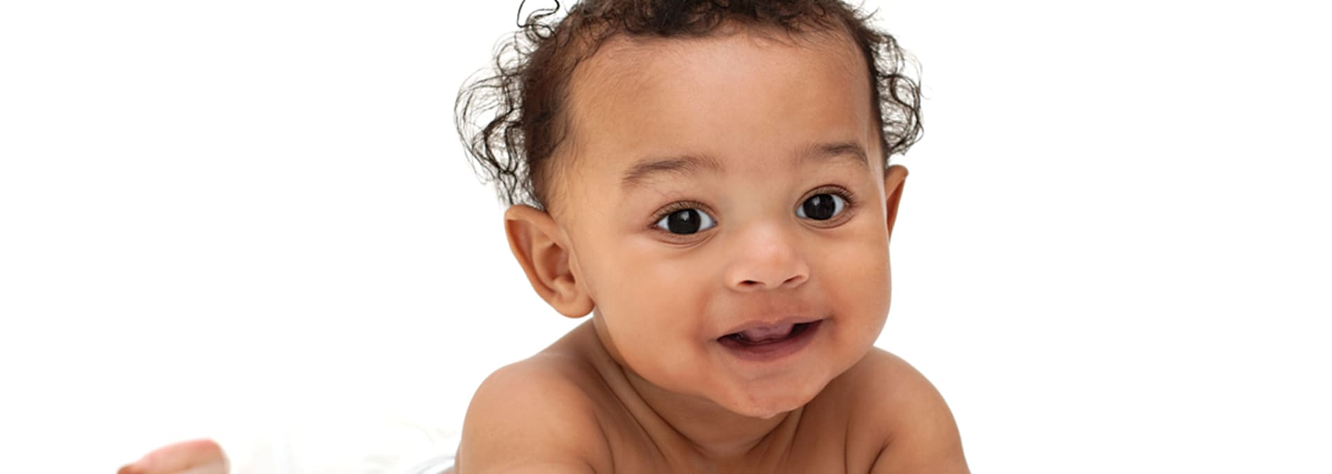 Baby ligger på maven - Semper Børnemad