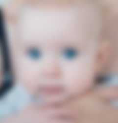 Header Baby - mother carrying baby