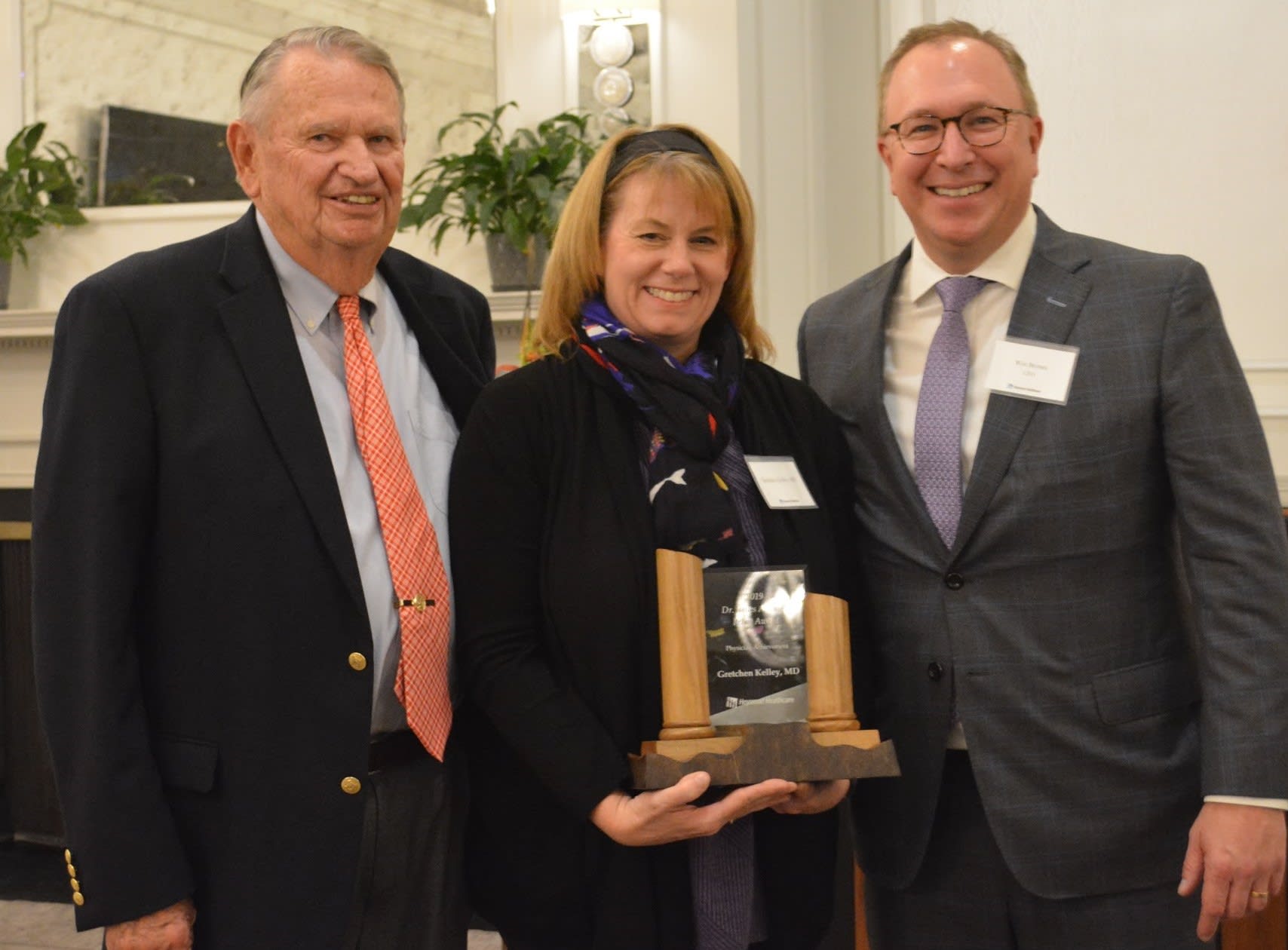 Dr. Gretchen Kelley receiving award in November 2019