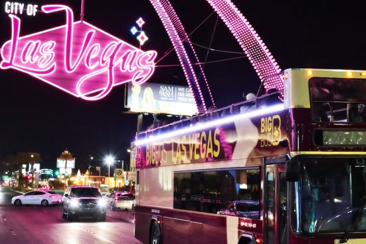 +21 Vegas Night Tour: Drink at Hard Rock Cafe + 2.5hr Live Guided Night Bus Tour image